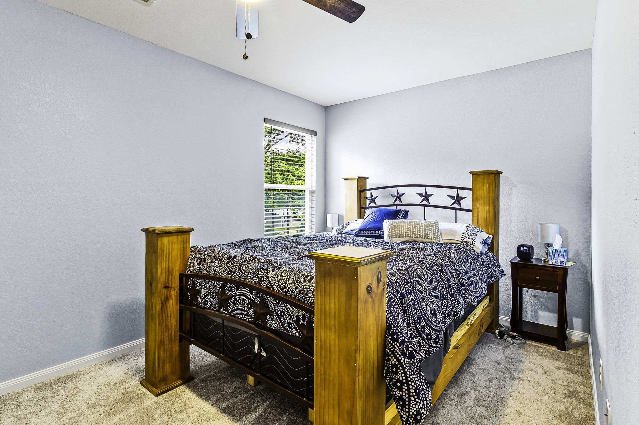 155 Cherry Tree Livingston, TX 77351 - Photo 10 of 24 a bedroom with a bed and a dresser in it