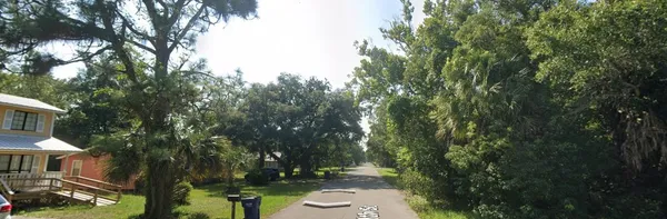 a view of a lake from a balcony