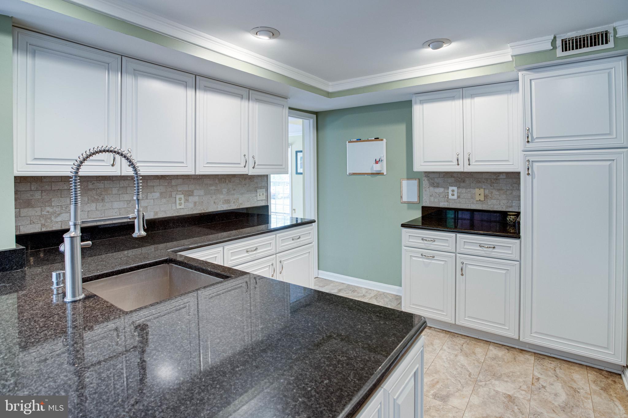 1542 Deer Point Way Reston, VA 20194 - Photo 21 of 68 Kitchen with Recessed Lighting and Crown Molding