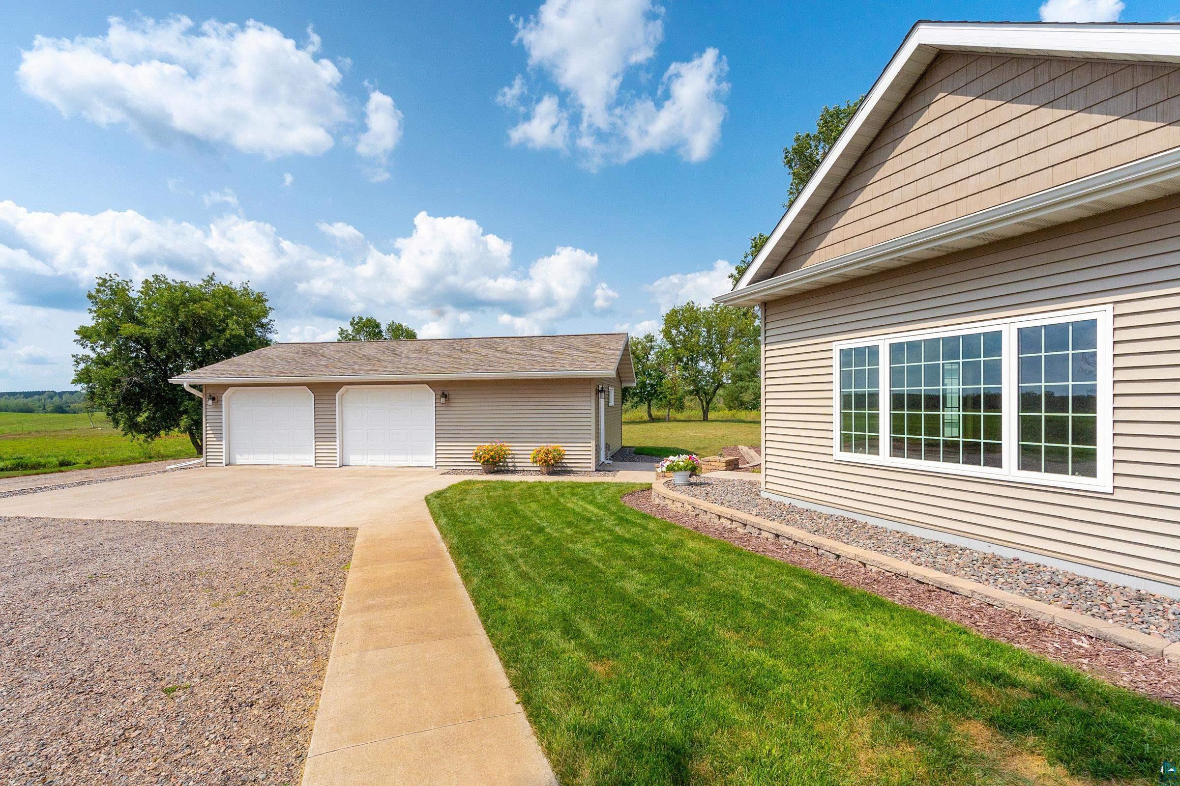 3673 Mattson Road Cloquet, MN 55720 - Photo 31 of 40 Sidewalk & Concrete Garage Pad