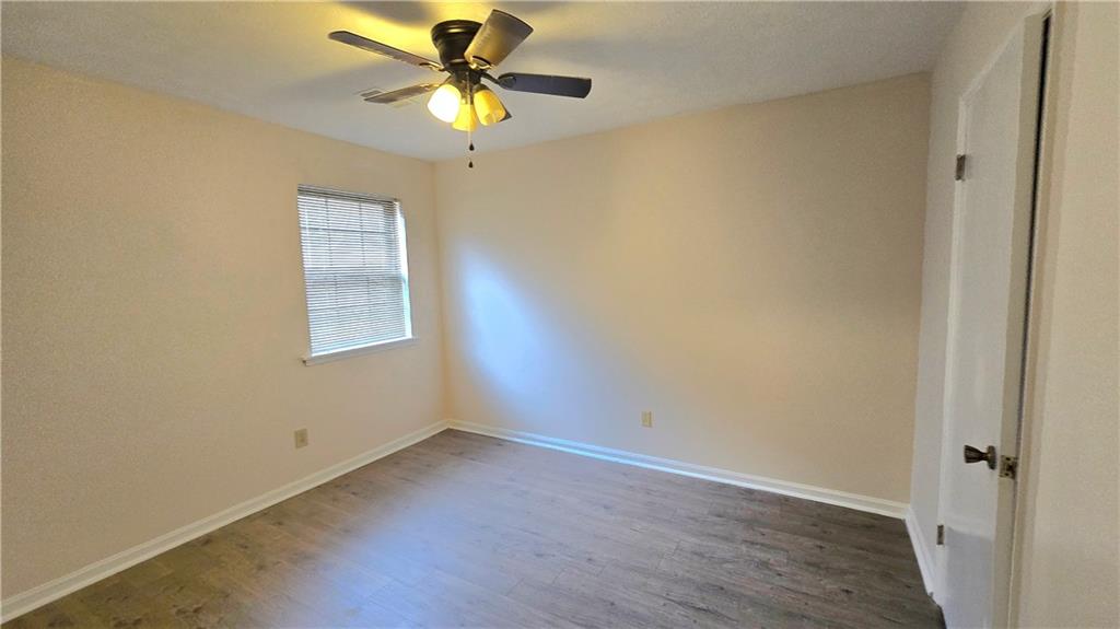 4722 Old Highgate Entry Stone Mountain, GA 30083 - Photo 23 of 31 a view of an empty room with a window