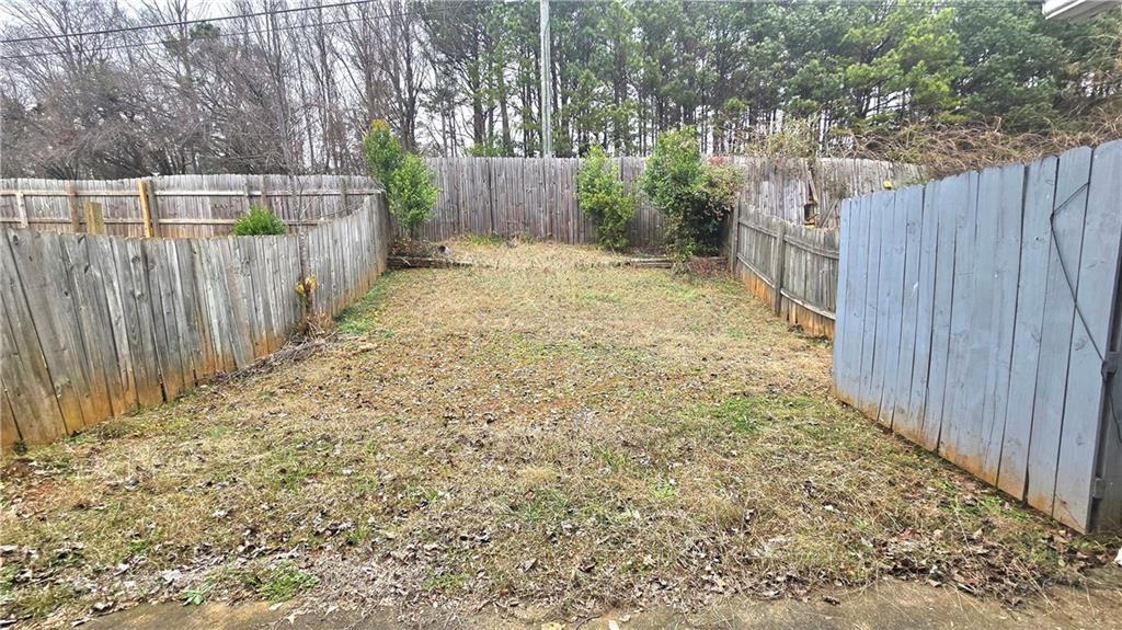 4722 Old Highgate Entry Stone Mountain, GA 30083 - Photo 30 of 31 a view of a backyard