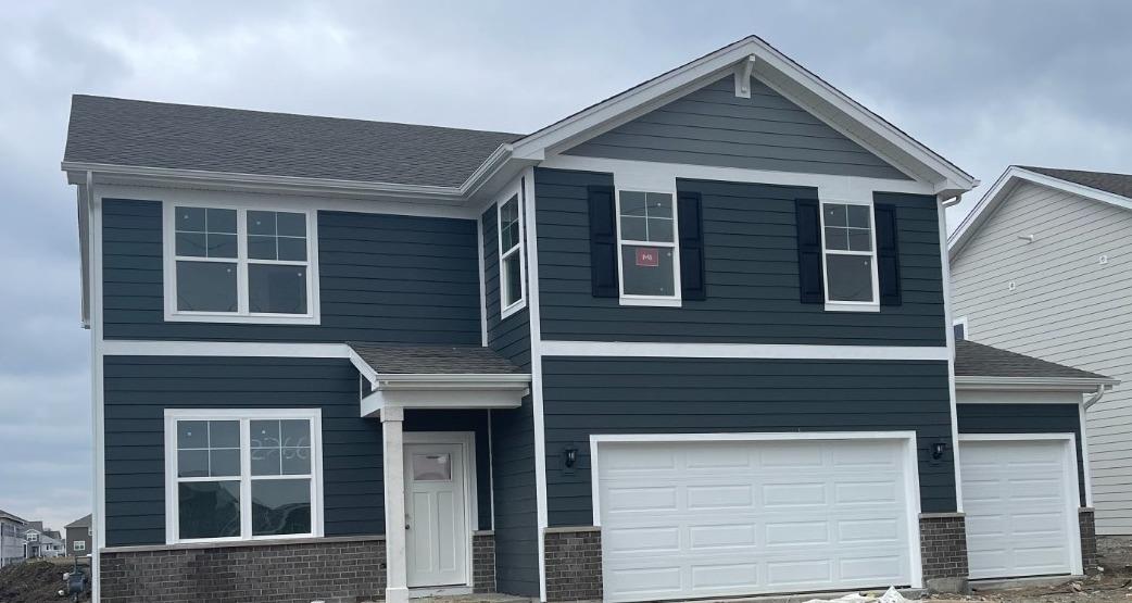 7718 West 103rd Street Crown Point, IN 46307 - Photo 2 of 47 a front view of a house
