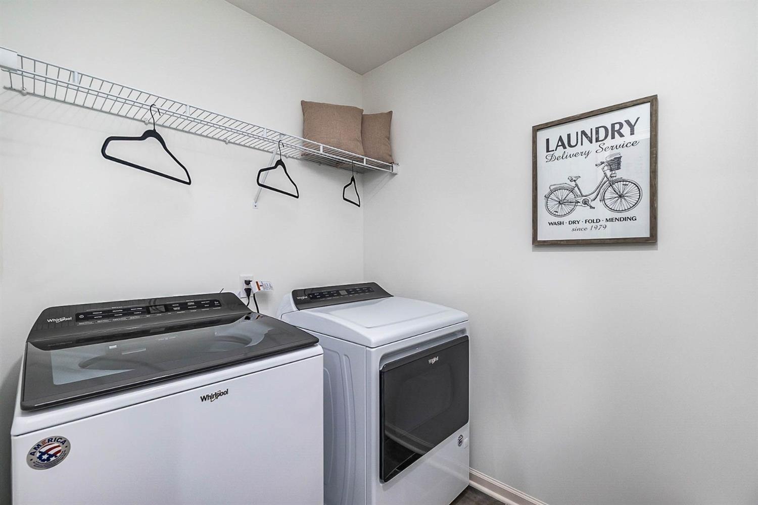 7718 West 103rd Street Crown Point, IN 46307 - Photo 31 of 47 a utility room with dryer and washer