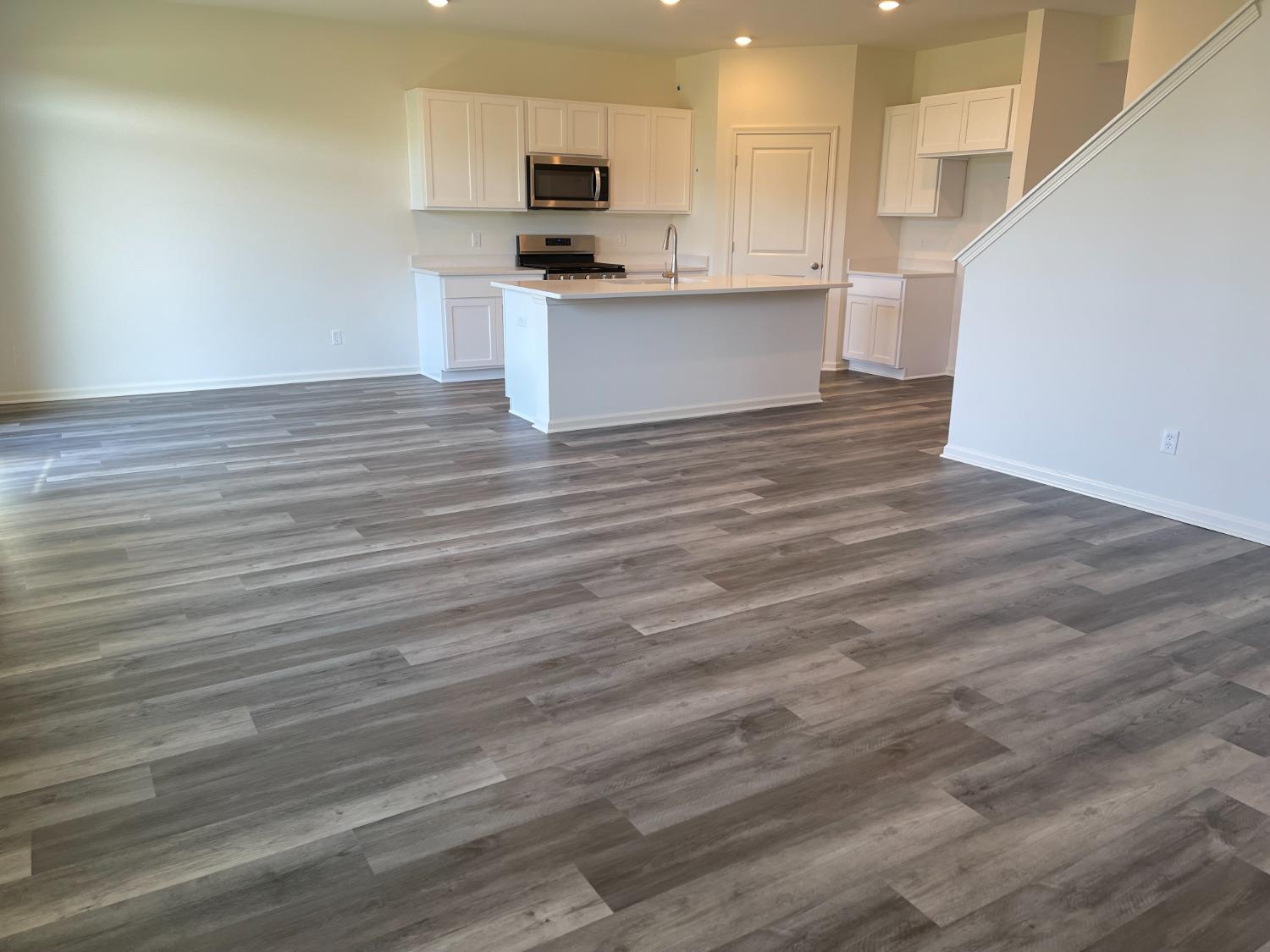 7718 West 103rd Street Crown Point, IN 46307 - Photo 36 of 47 a view of kitchen with microwave and cabinets