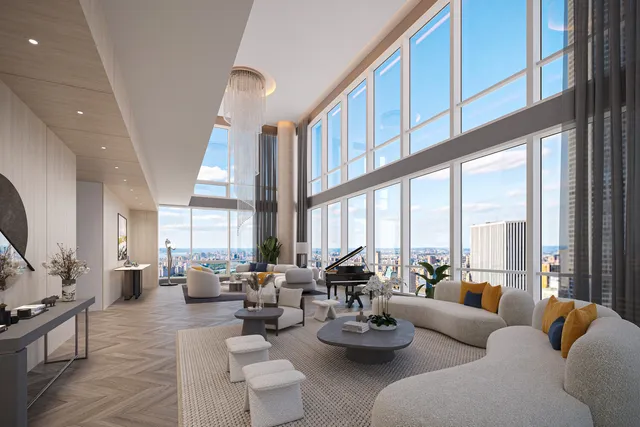 a living room with furniture fireplace and a large window