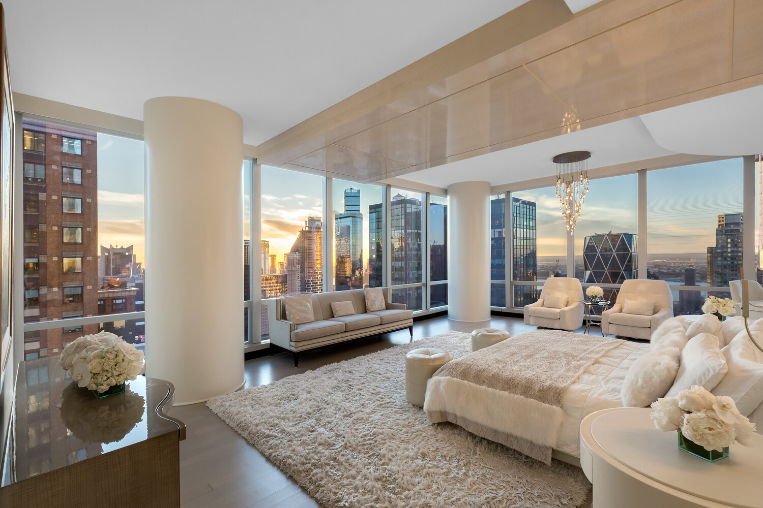 157 West 57th Street, Unit 52/53B Manhattan, NY 10019 - Photo 13 of 20 a living room with furniture and a large window