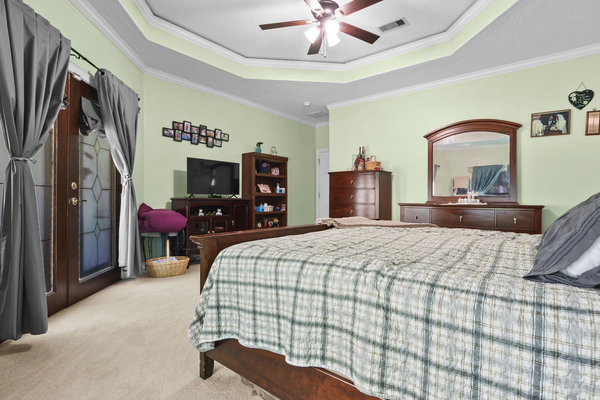 15524 Jim Branch Road Dayton, TX 77535 - Photo 13 of 40 Designed for comfort, privacy and relaxation. Double doors head out to the patio