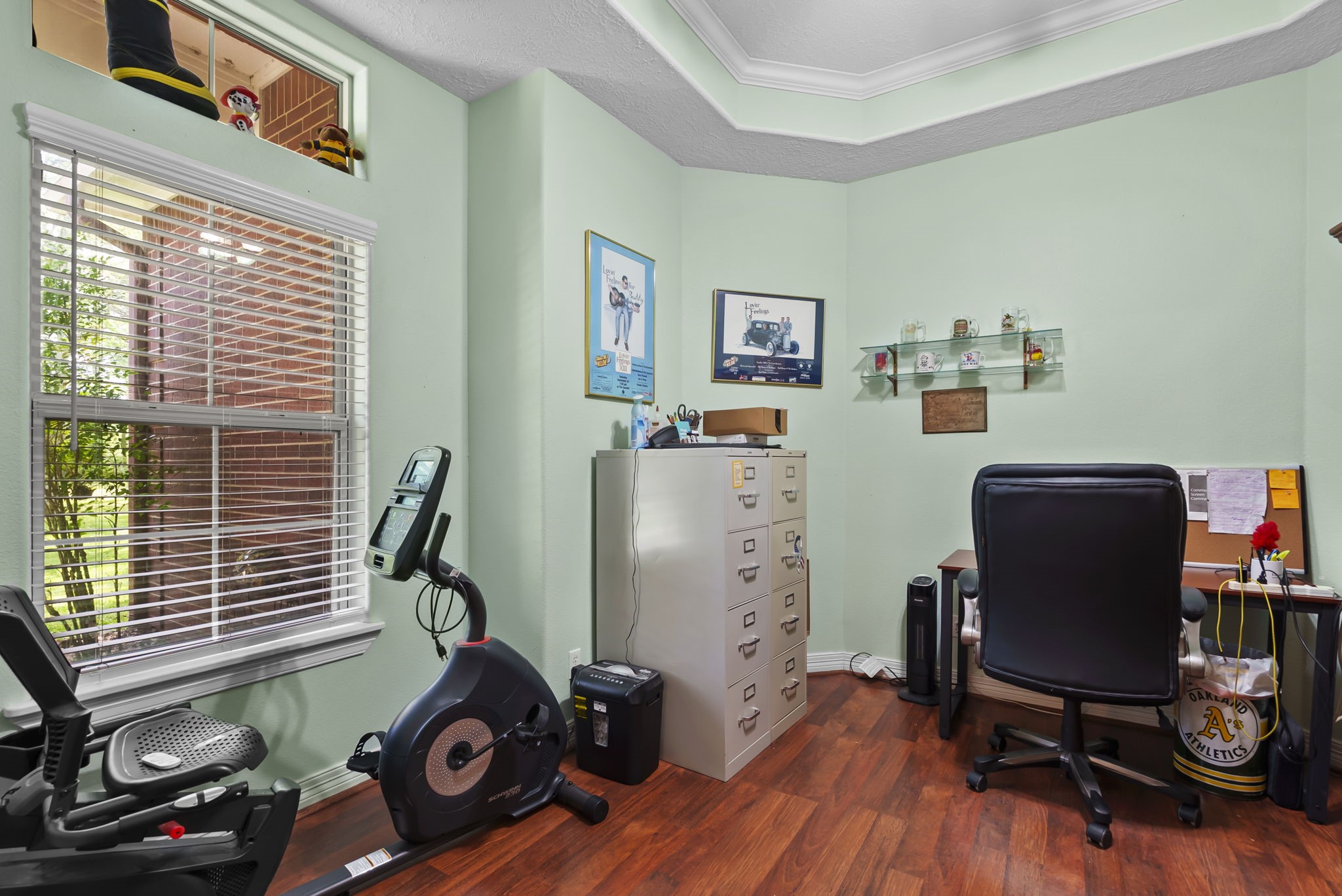 15524 Jim Branch Road Dayton, TX 77535 - Photo 18 of 40 a view of a workspace with furniture and a window