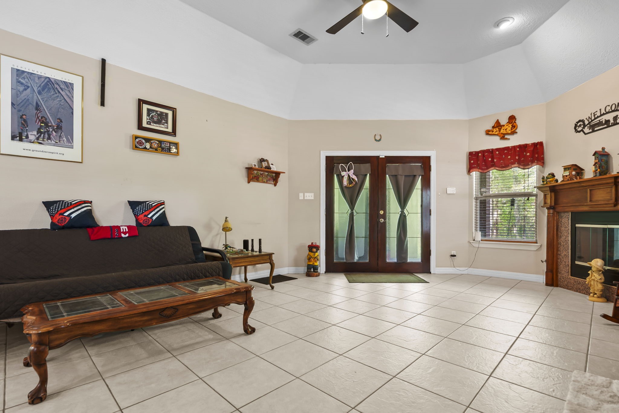 15524 Jim Branch Road Dayton, TX 77535 - Photo 29 of 40 a living room with furniture and a fireplace