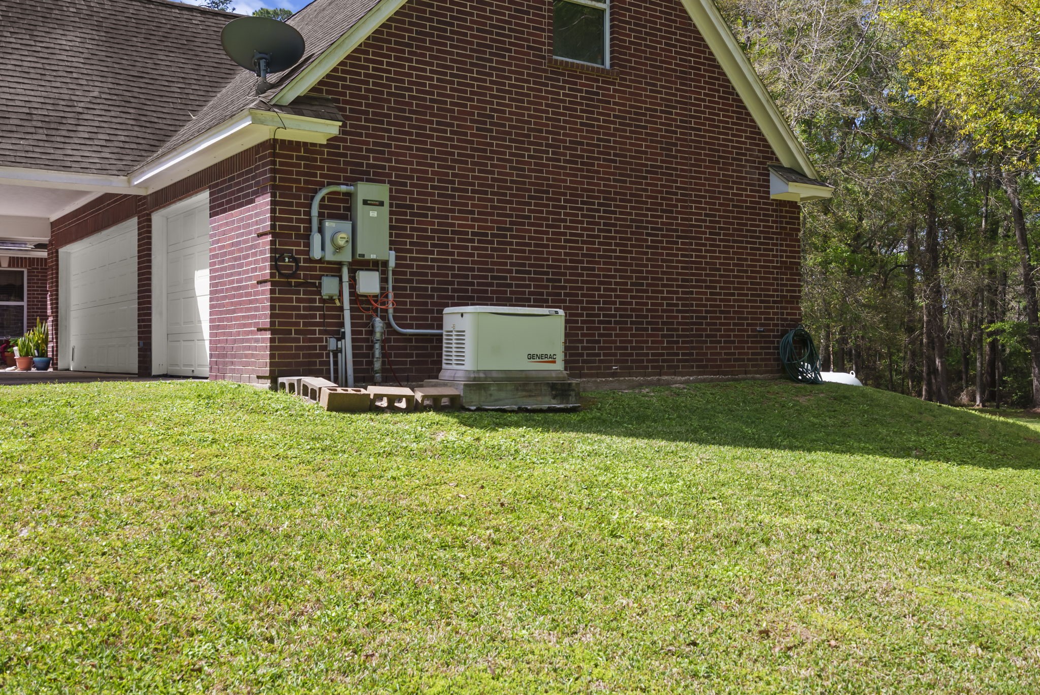 15524 Jim Branch Road Dayton, TX 77535 - Photo 31 of 40 a brick house with a yard