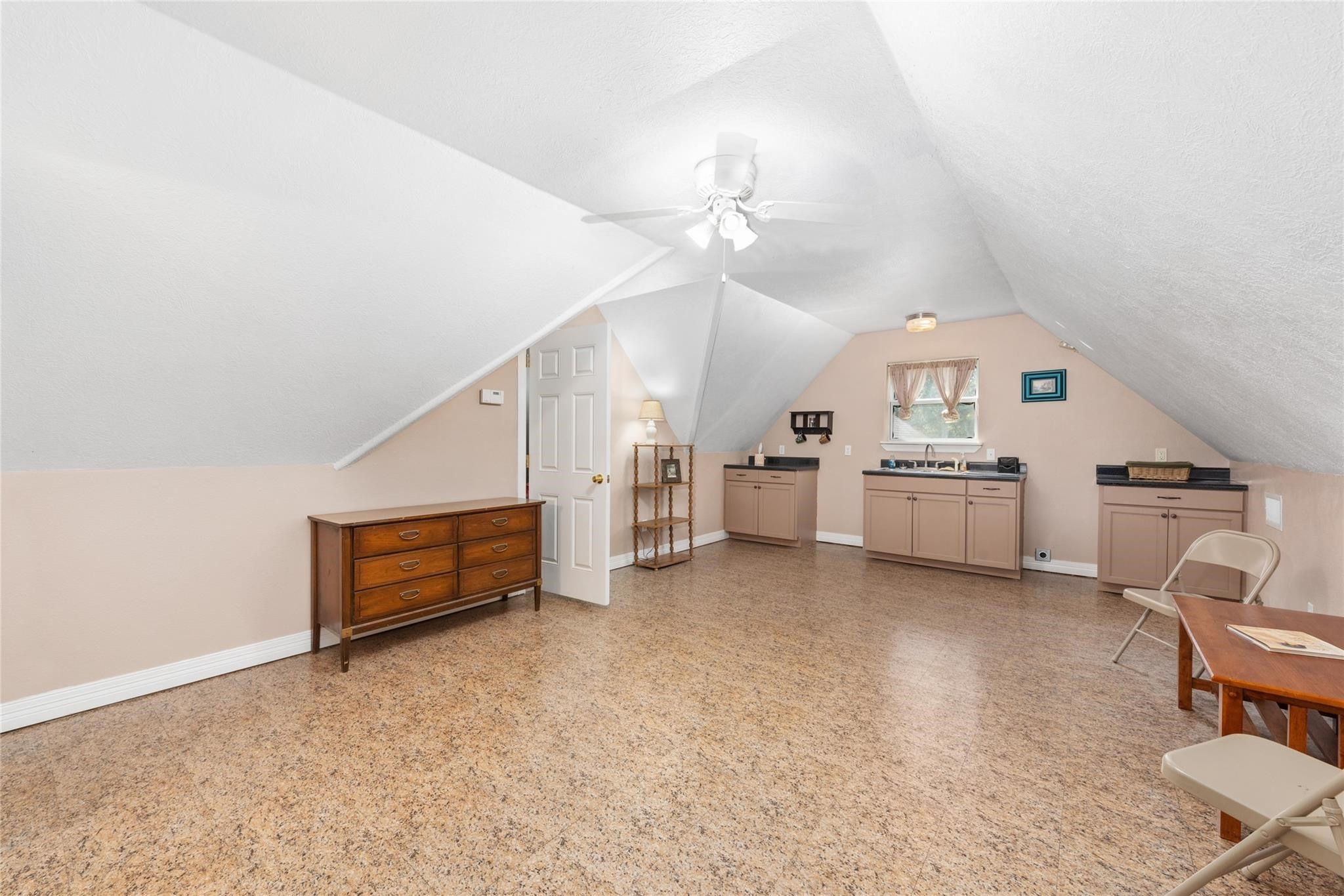 15524 Jim Branch Road Dayton, TX 77535 - Photo 32 of 40 a view of a livingroom with furniture and a ceiling fan