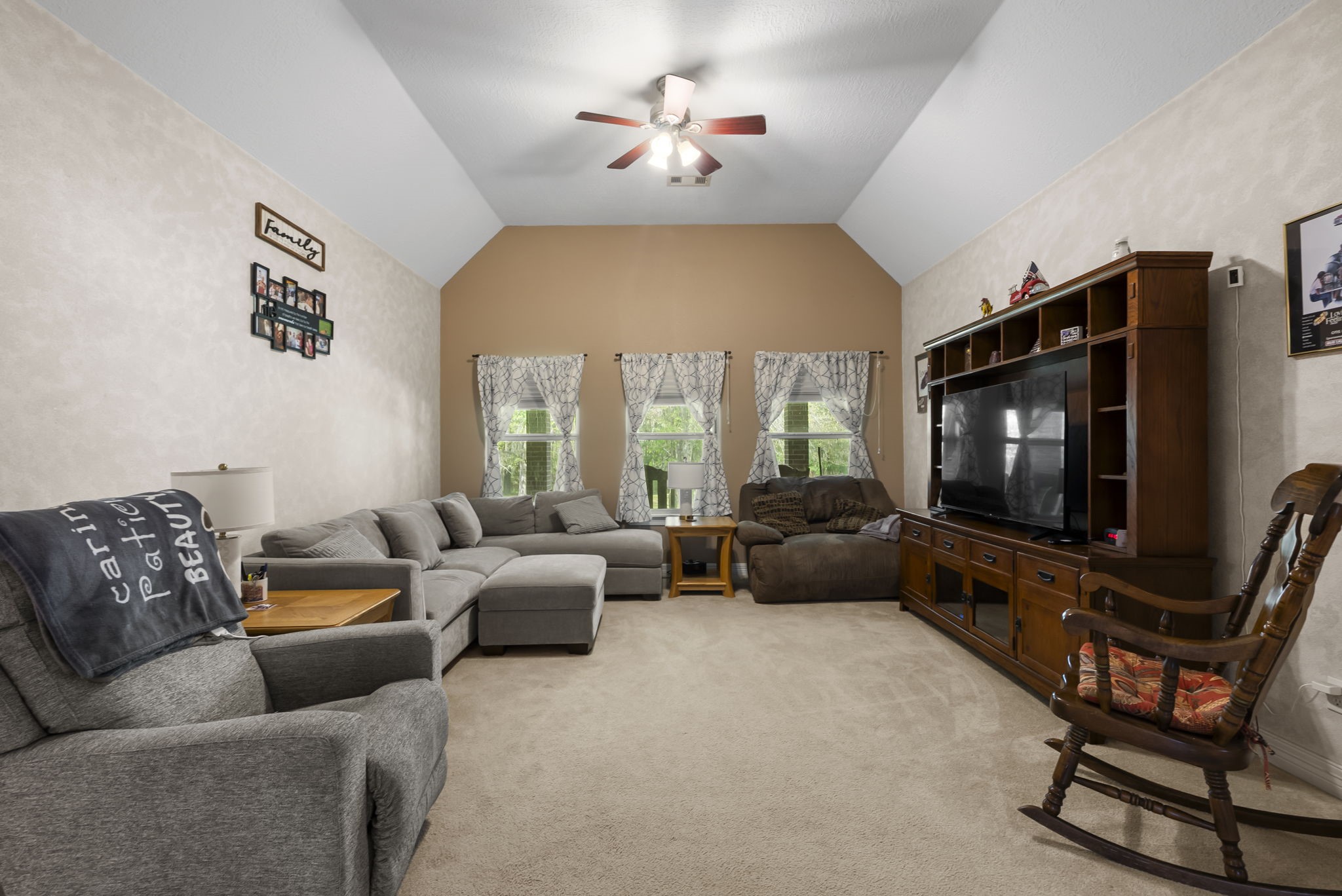 15524 Jim Branch Road Dayton, TX 77535 - Photo 5 of 40 Enjoy a cozy yet spacious living room filled with natural light and designed for everyday comfort