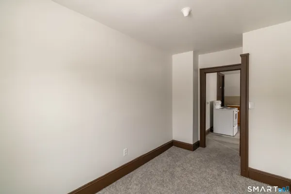a view of hallway with closet