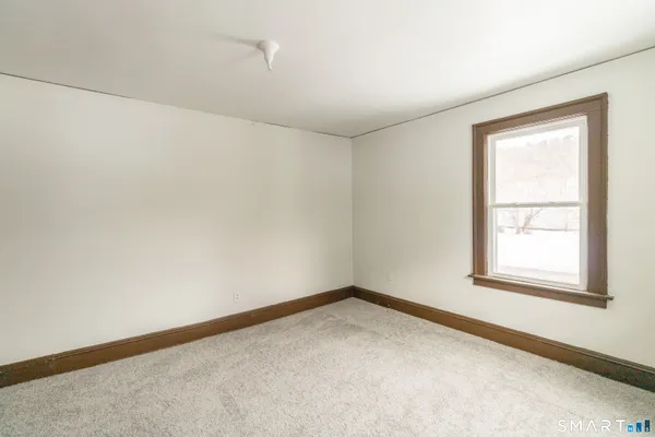 an empty room with a window