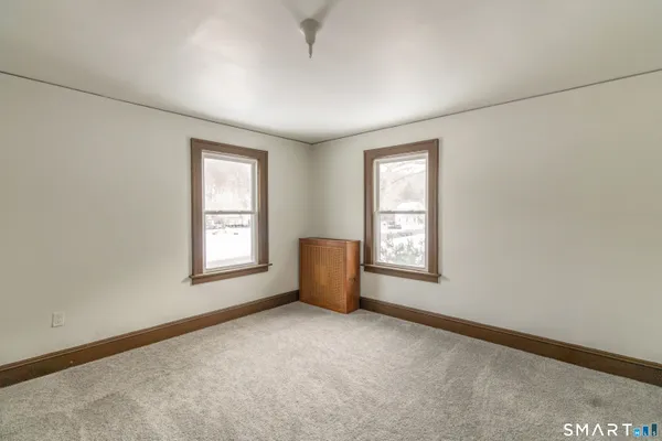 an empty room with windows