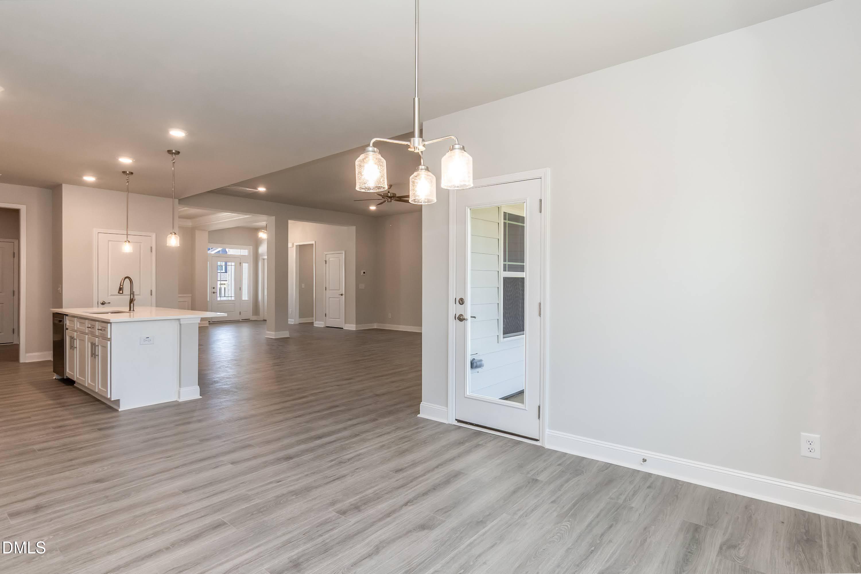 49 Galway Road Lillington, NC 27546 - Photo 15 of 39 a view of a room with wooden floor and a large window