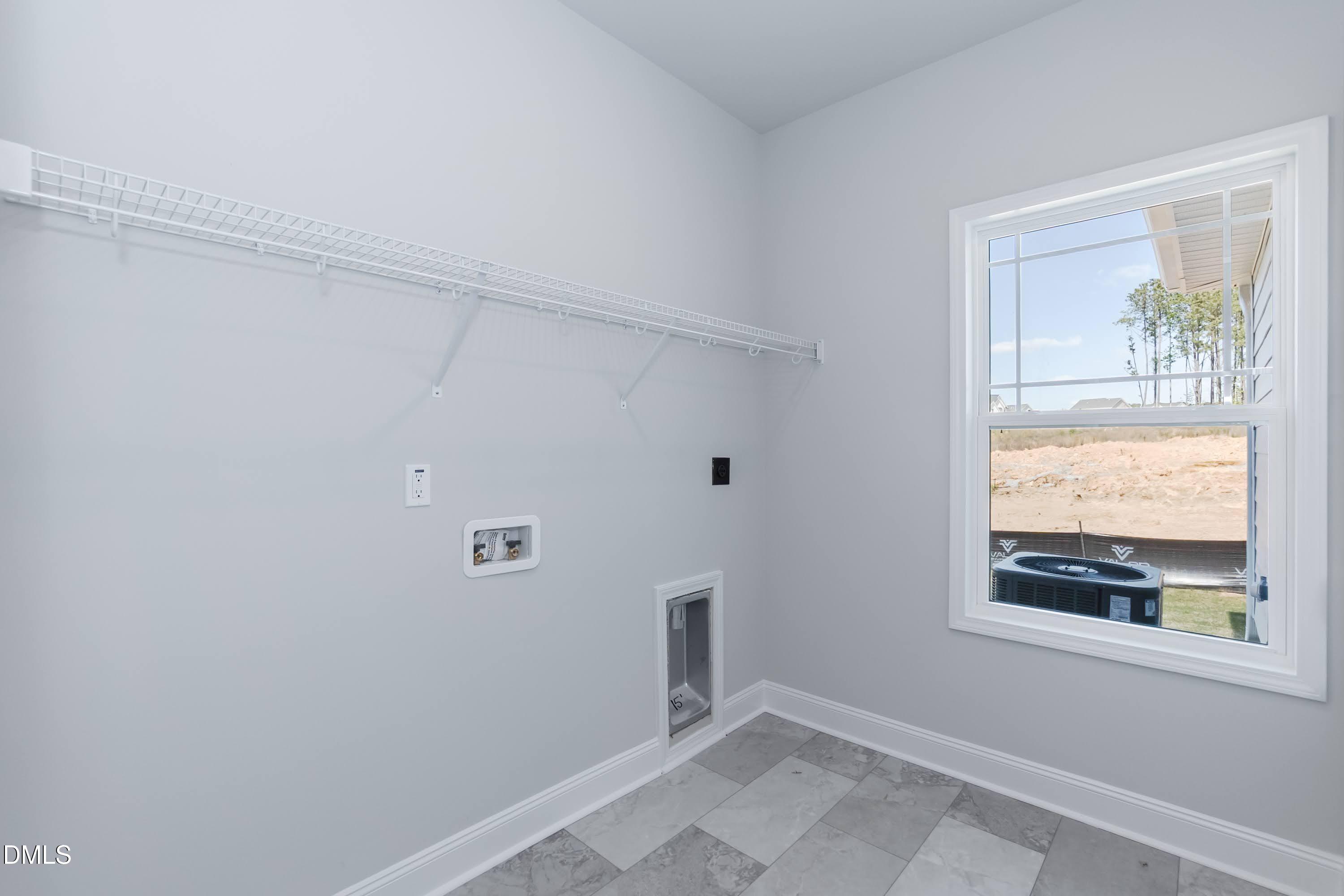 49 Galway Road Lillington, NC 27546 - Photo 19 of 39 a view of an empty room with a window