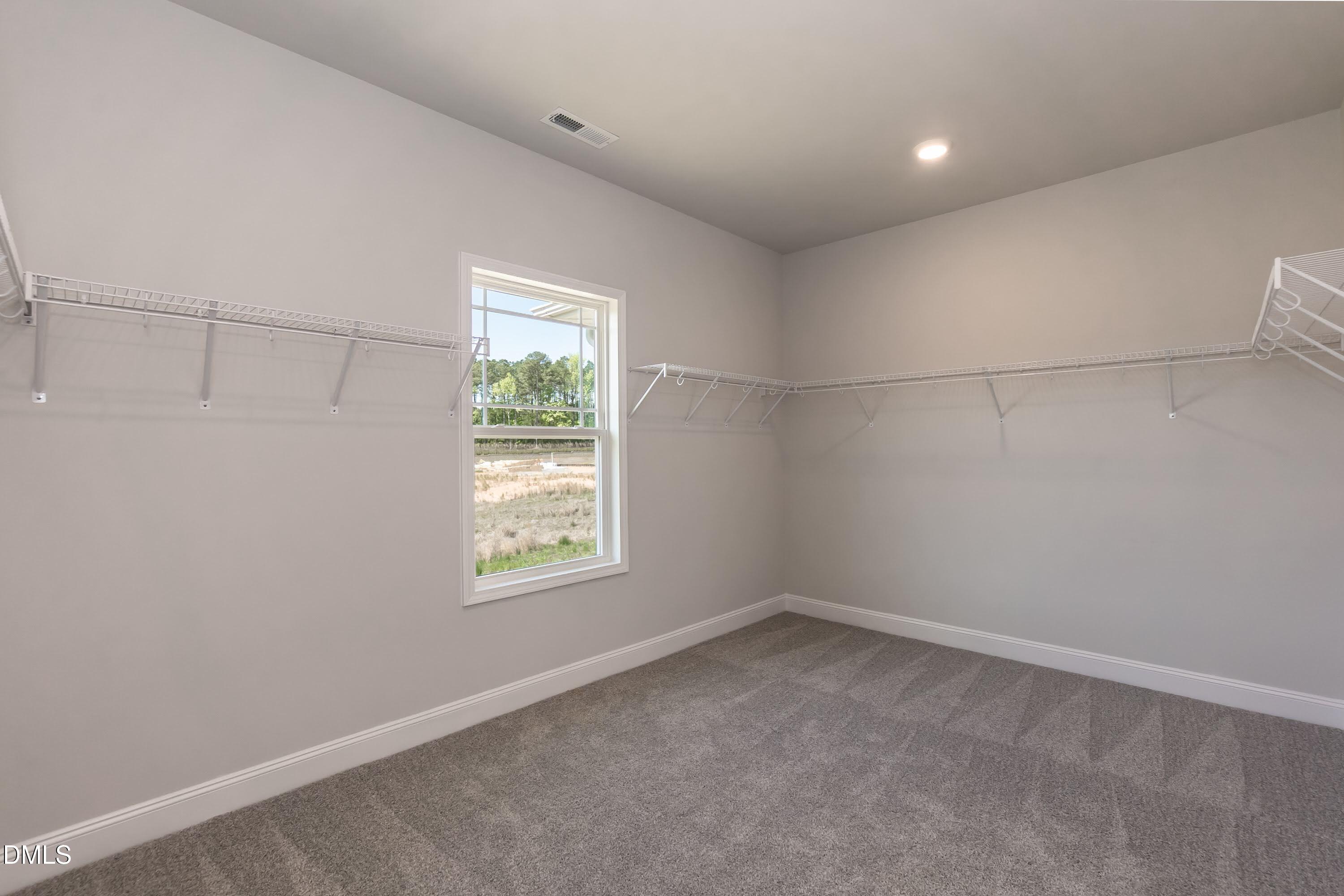 49 Galway Road Lillington, NC 27546 - Photo 23 of 39 an empty room with windows