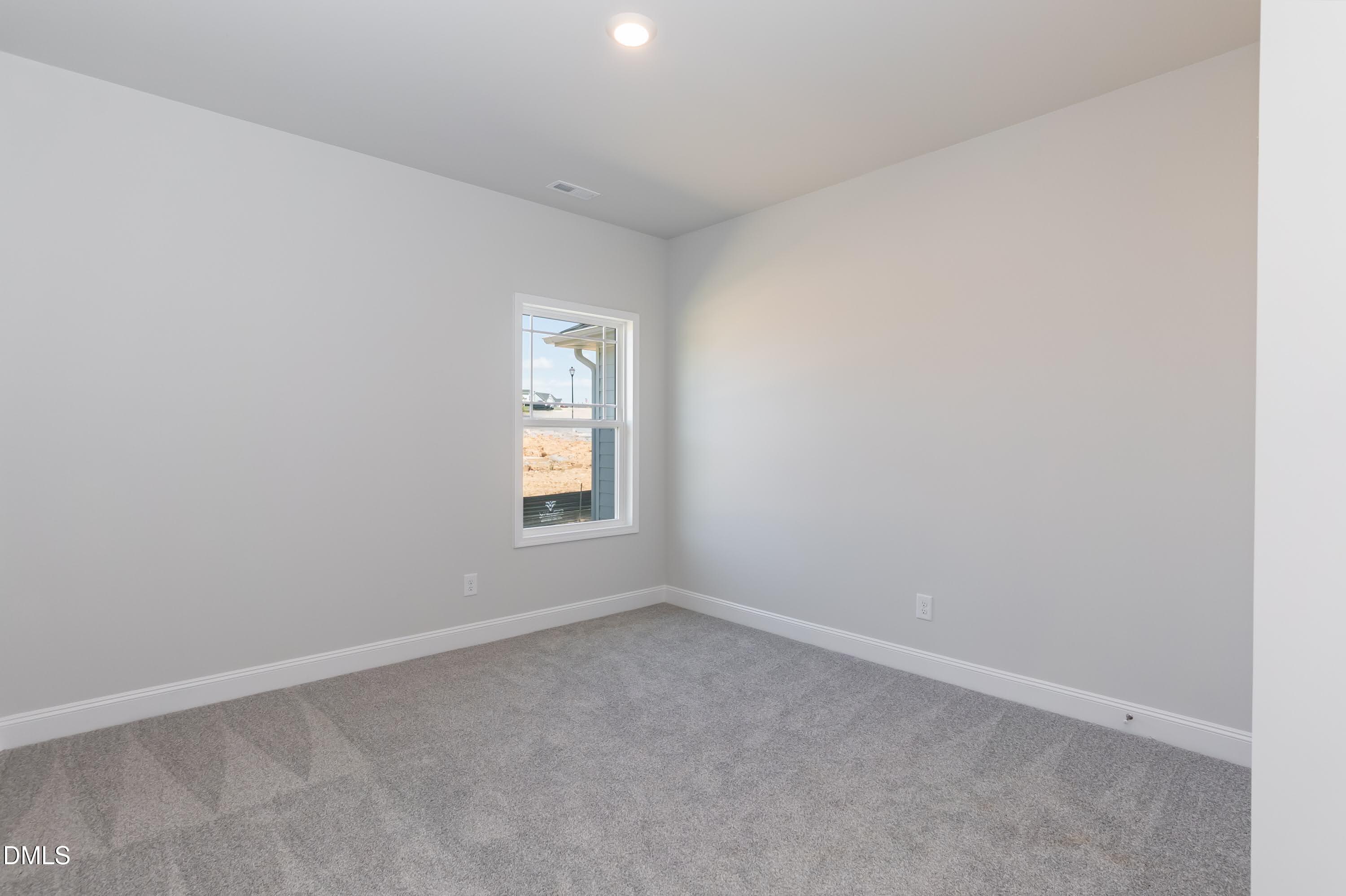 49 Galway Road Lillington, NC 27546 - Photo 27 of 39 an empty room with windows