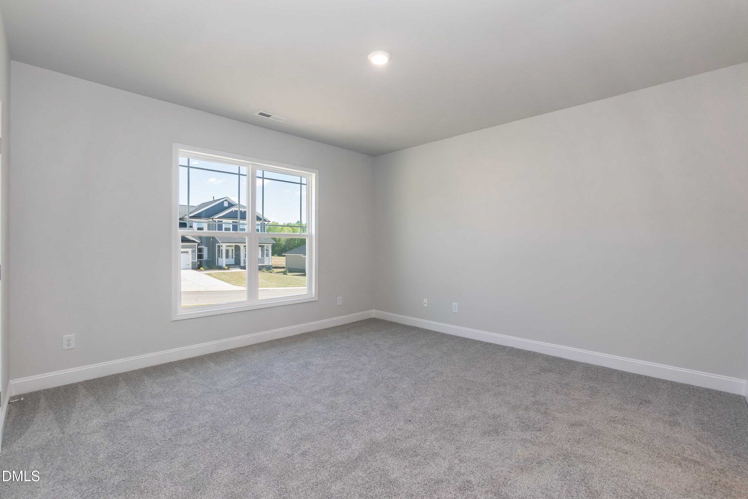 49 Galway Road Lillington, NC 27546 - Photo 29 of 39 an empty room with a window