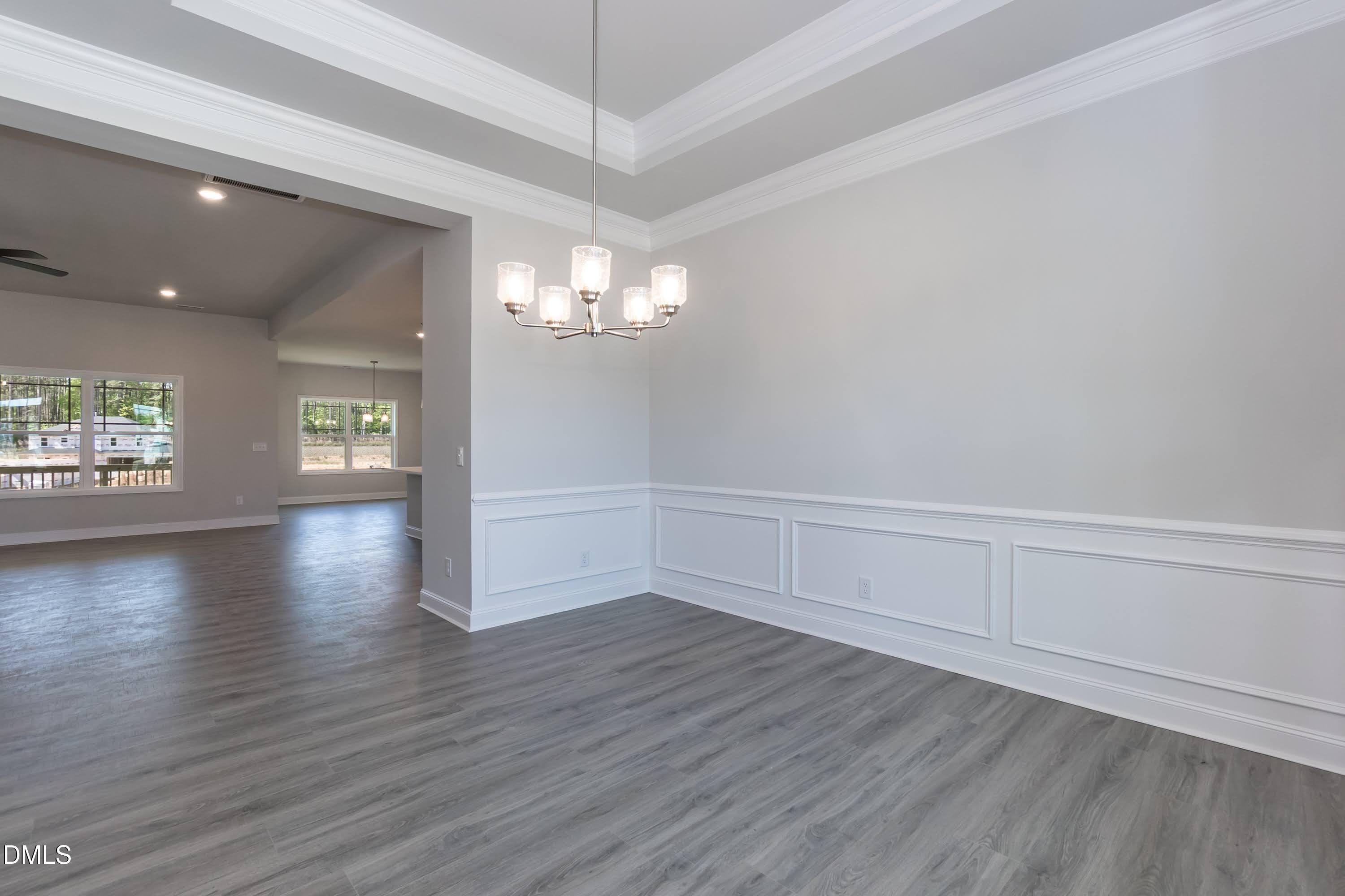 49 Galway Road Lillington, NC 27546 - Photo 6 of 39 wooden floor in an empty room with a window