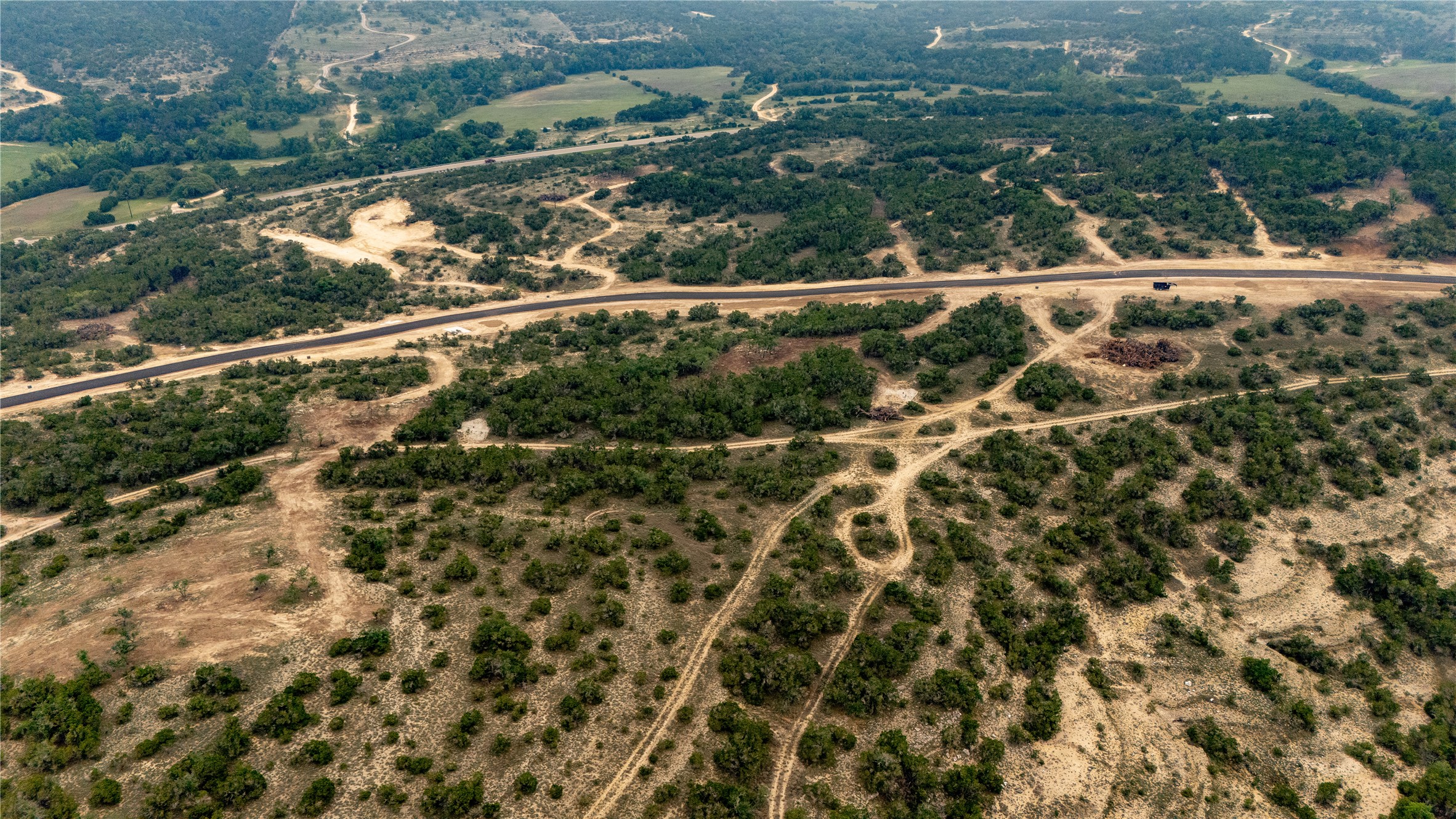 Lot 20 Ranch Road 165 Dripping Springs, TX 78620 - Photo 4 of 9 Expansive land featuring mature trees and varied topography