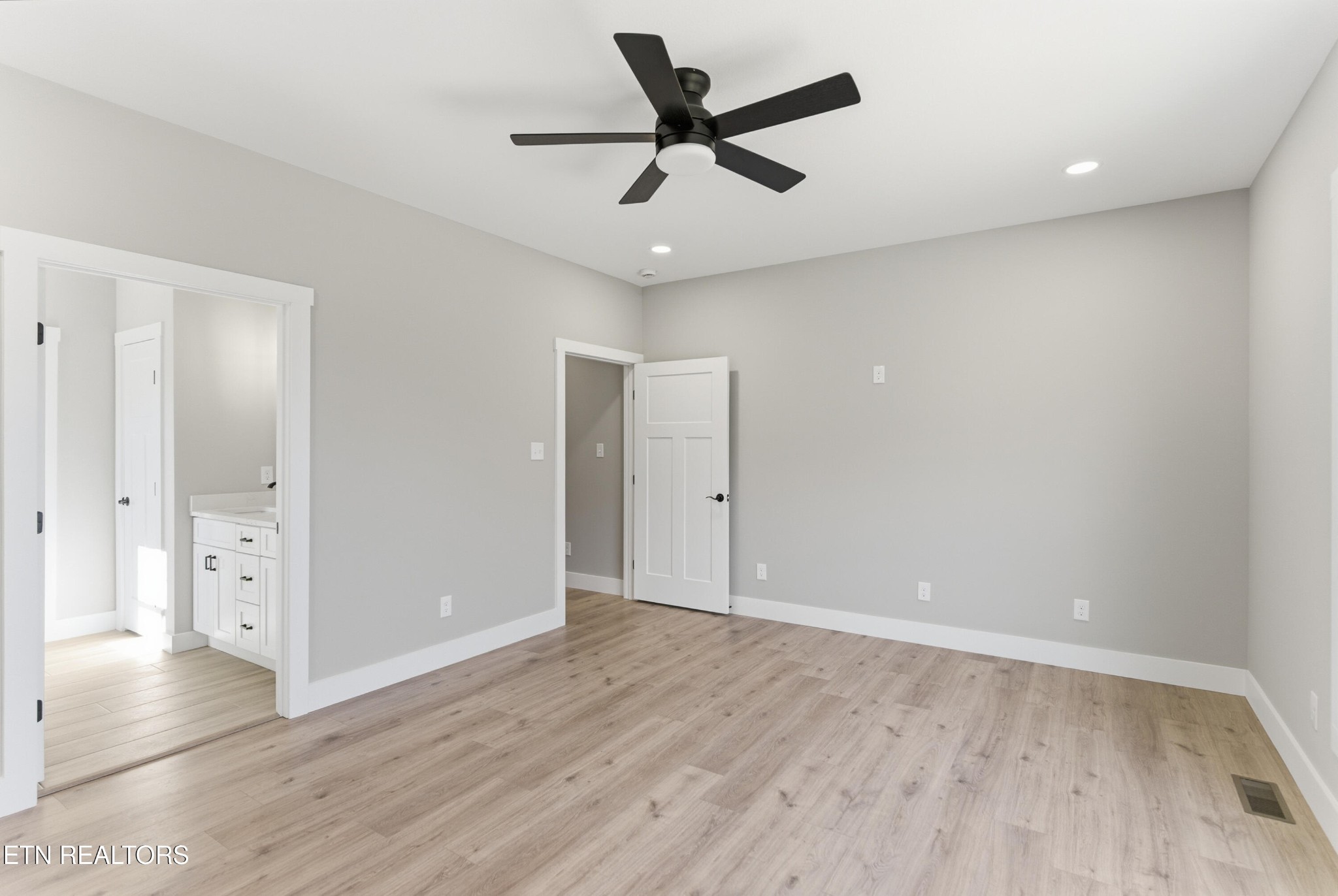 153 Washita Lane Rutledge, TN 37861 - Photo 18 of 44 wooden floor in an empty room with a window