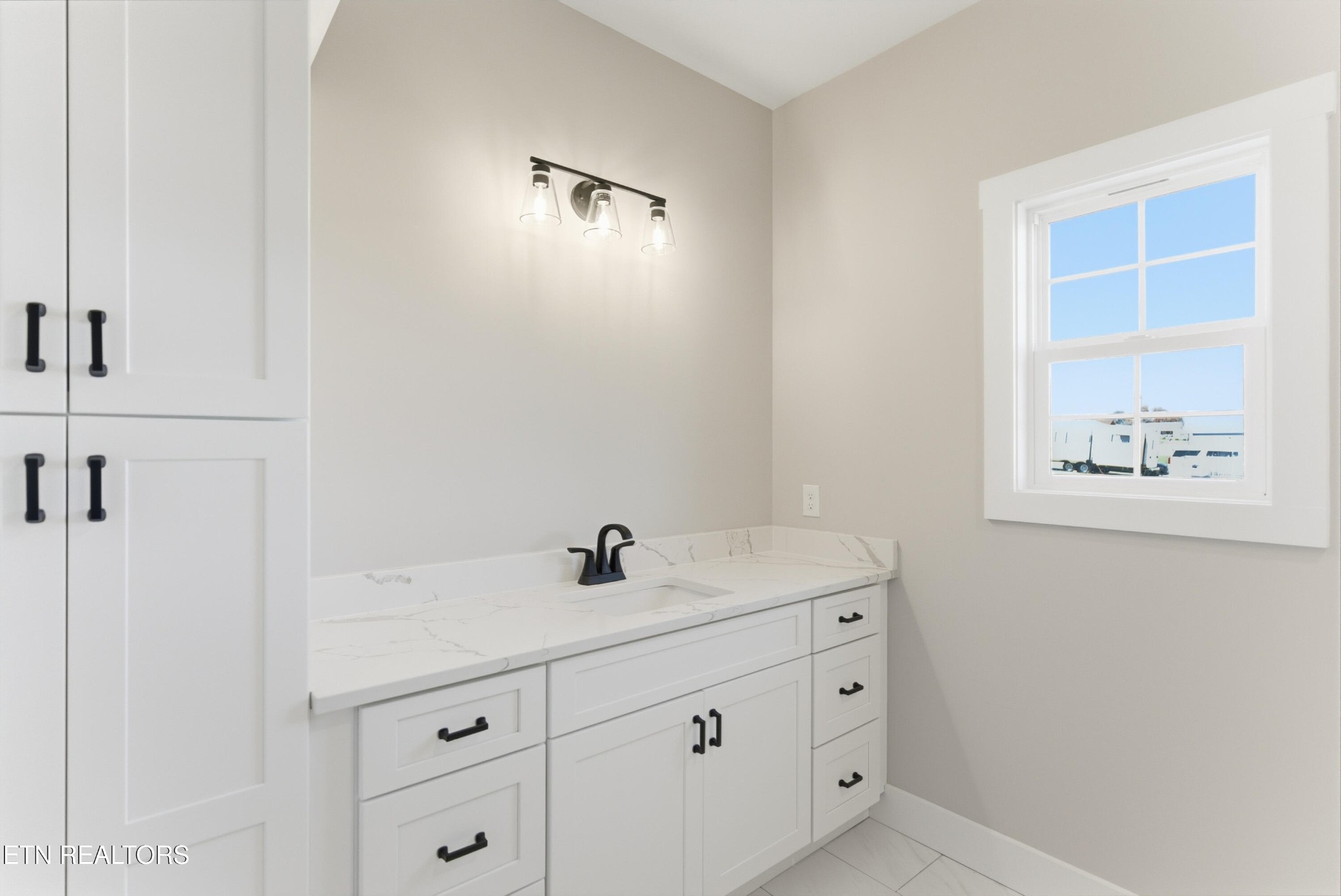 153 Washita Lane Rutledge, TN 37861 - Photo 19 of 44 a bathroom with a sink and a mirror