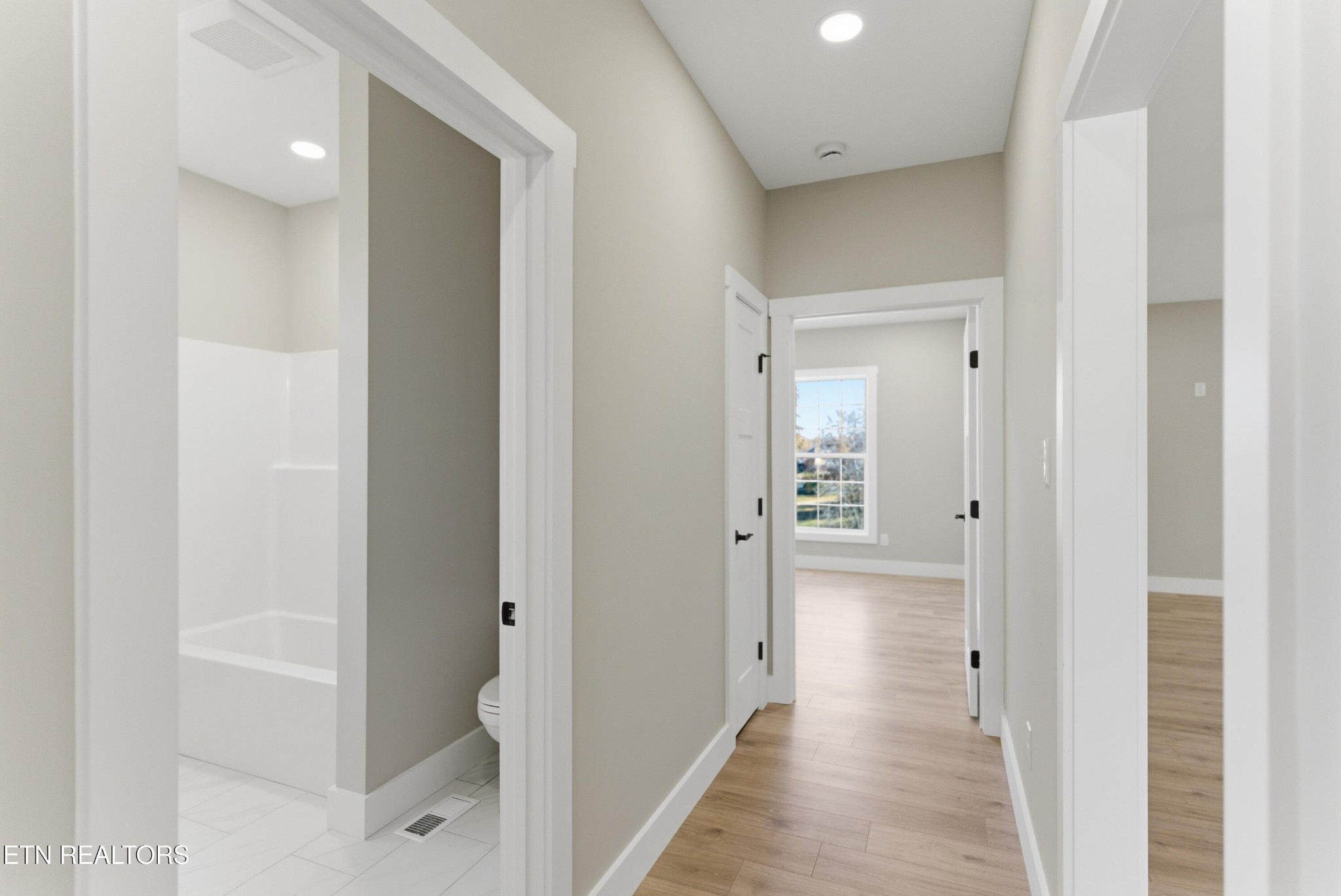 153 Washita Lane Rutledge, TN 37861 - Photo 23 of 44 a view of a hallway with a wooden cabinets