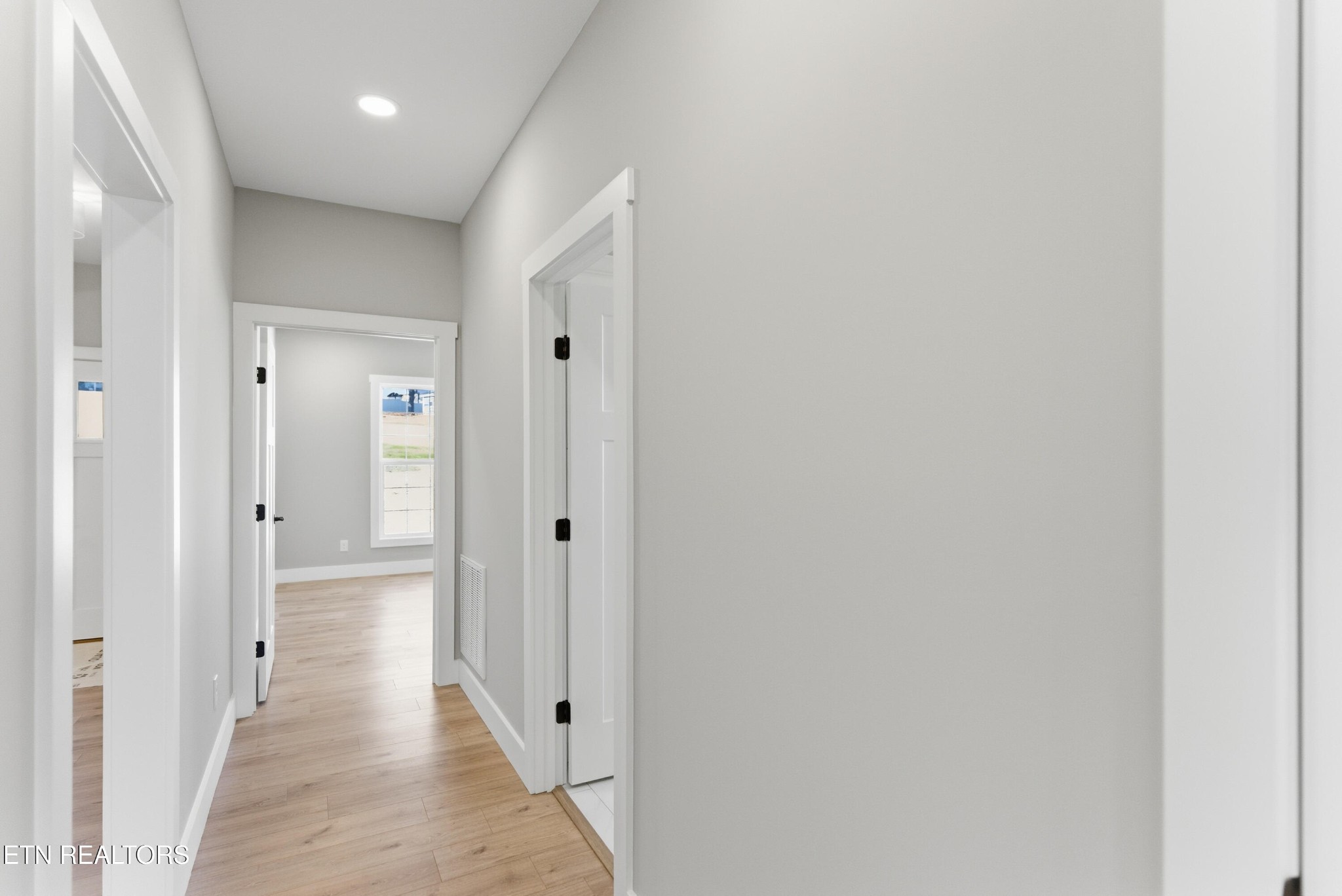 153 Washita Lane Rutledge, TN 37861 - Photo 24 of 44 a view of a hallway with wooden floor