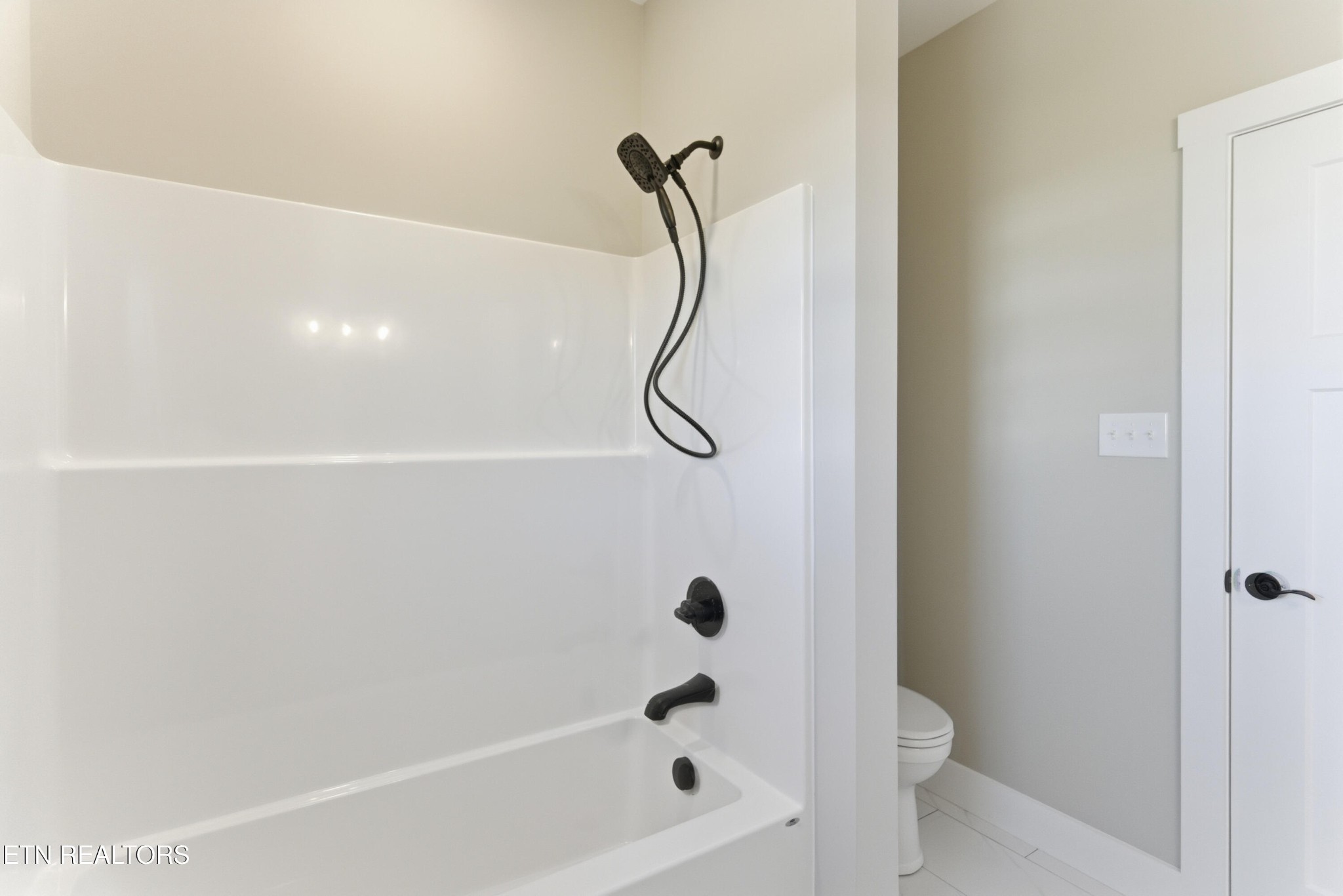 153 Washita Lane Rutledge, TN 37861 - Photo 27 of 44 a bathroom with a shower and a toilet