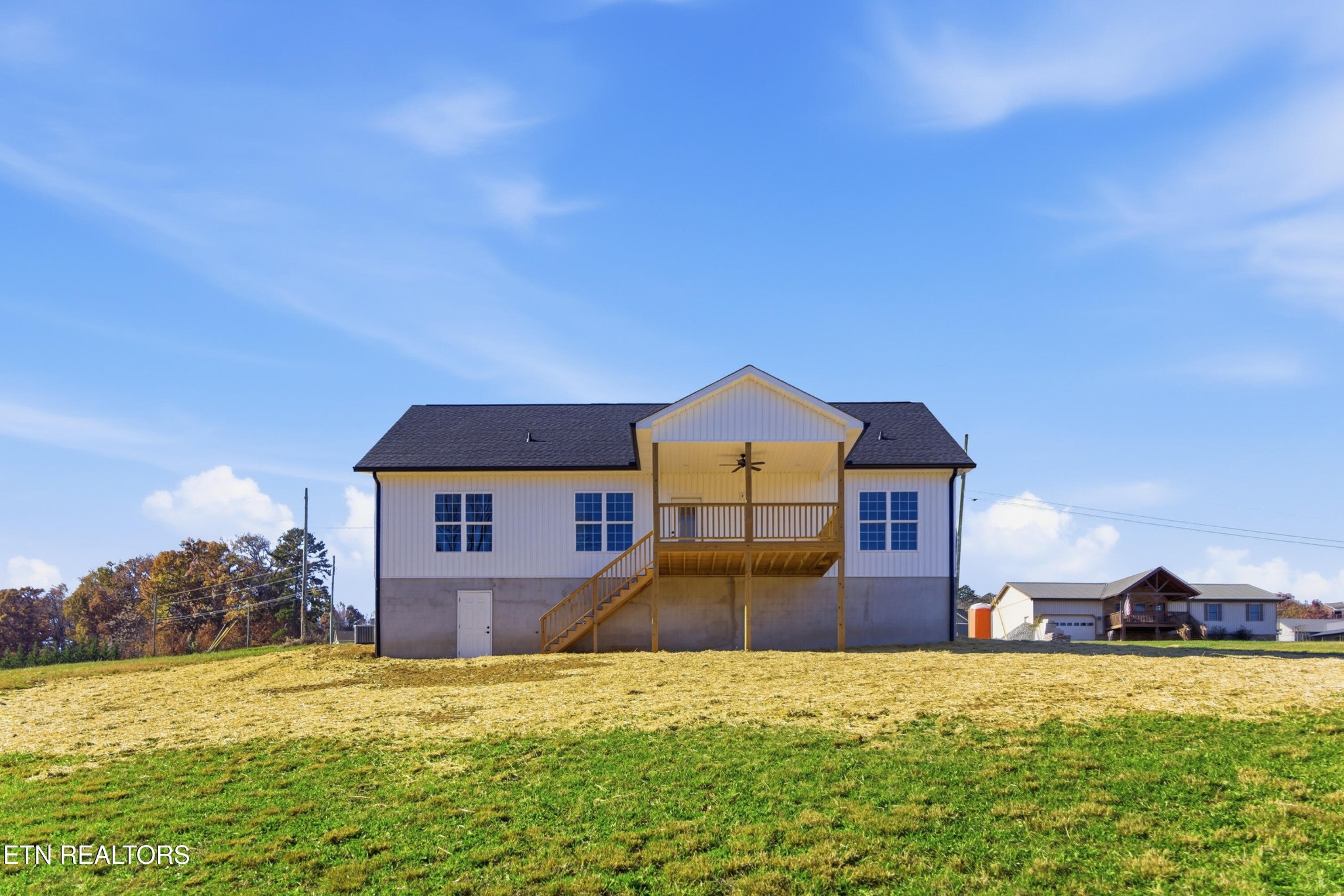 153 Washita Lane Rutledge, TN 37861 - Photo 42 of 44 a front view of a house with a yard