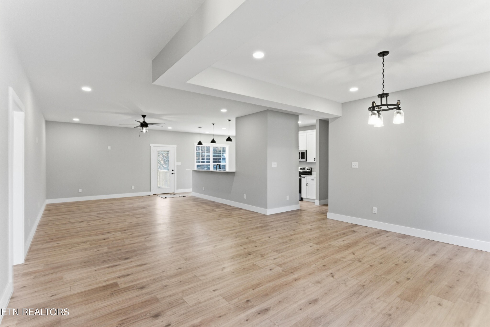 153 Washita Lane Rutledge, TN 37861 - Photo 8 of 44 a view of an empty room with window and wooden floor