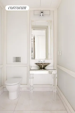 a kitchen with stainless steel appliances granite countertop a stove and a refrigerator