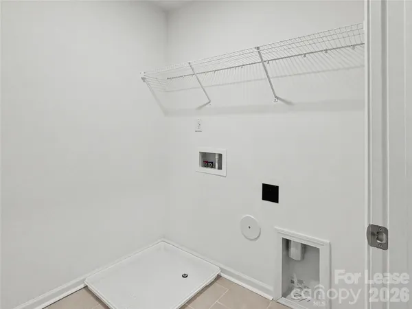 a bathroom with a shower and a shower