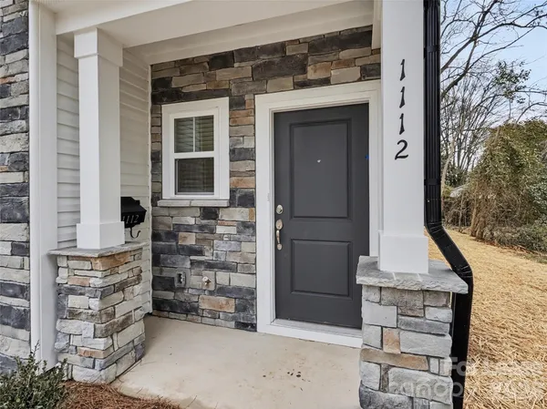 front view of a house with an outdoor space
