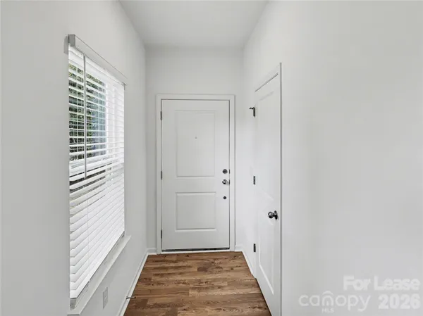 a view of a bathroom from the hallway