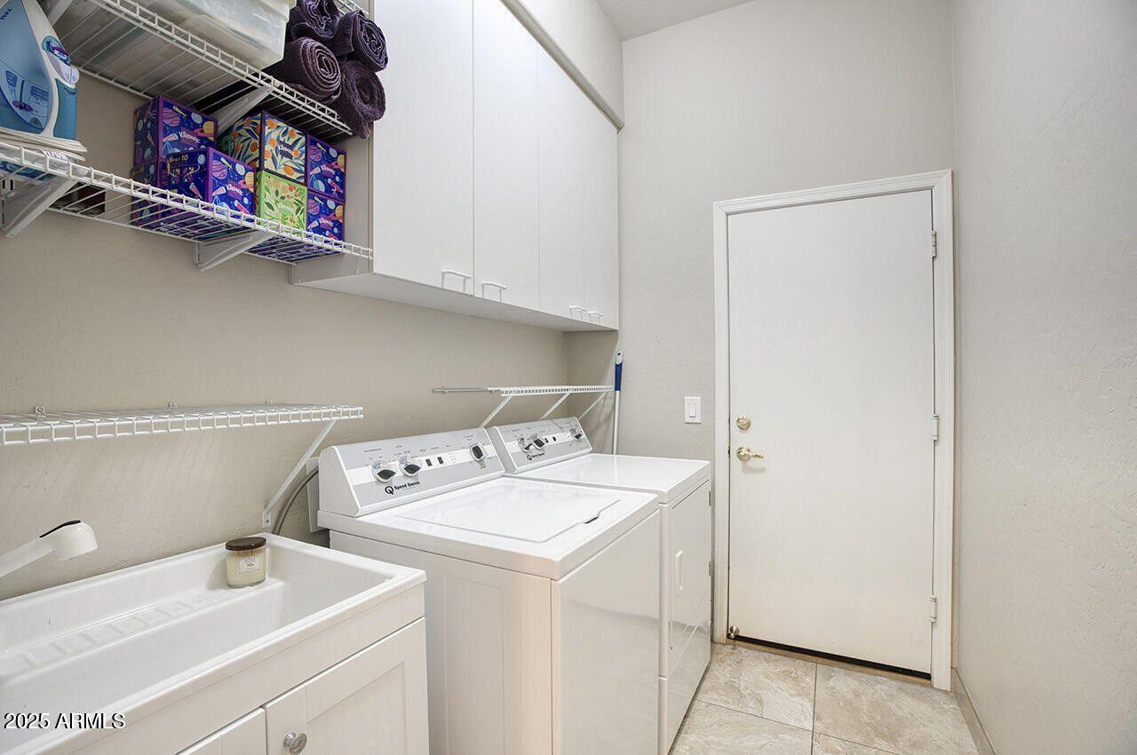 7726 South El Camino Drive Tempe, AZ 85284 - Photo 14 of 17 a utility room with dryer and washer