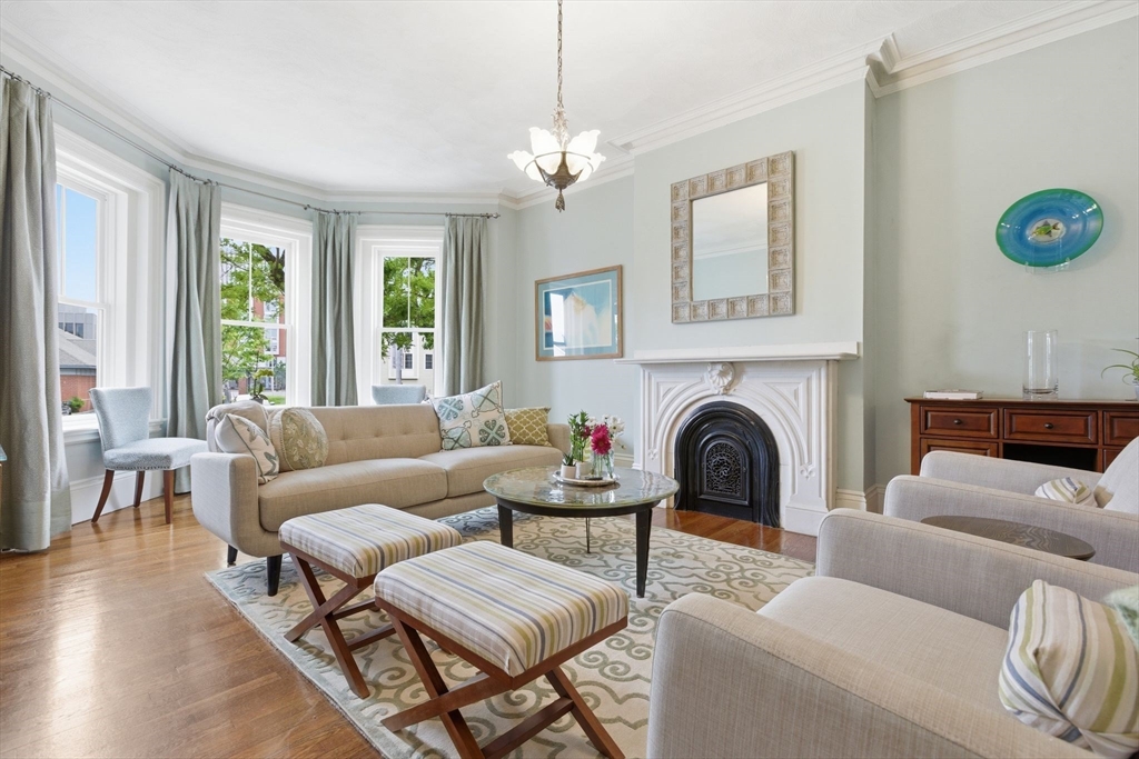 419 Main Street Boston, MA 02129 - Photo 1 of 41 a living room with furniture and a fireplace