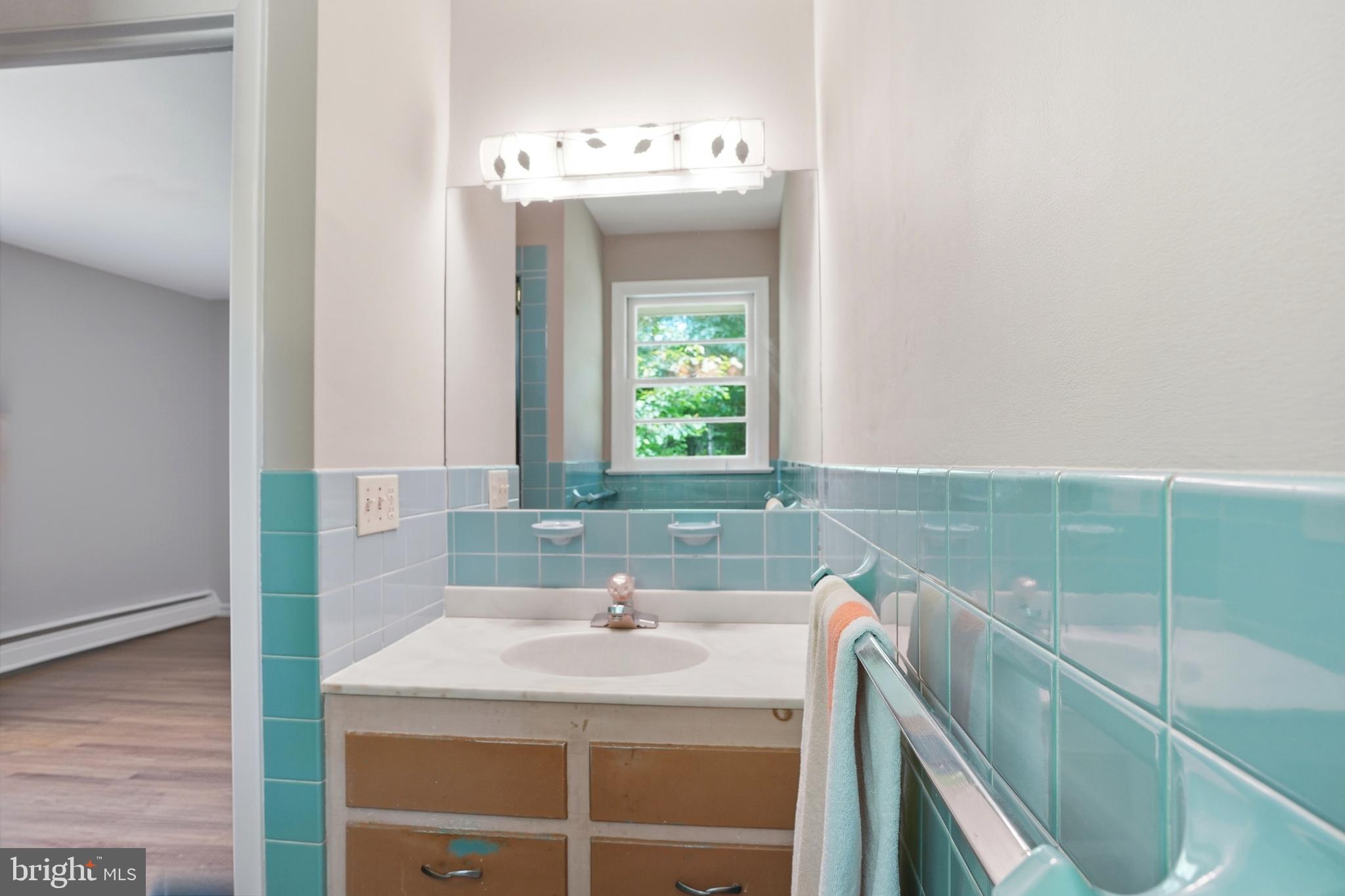 486 Derstine Road Hatfield, PA 19440 - Photo 26 of 53 a bathroom with a sink and a mirror
