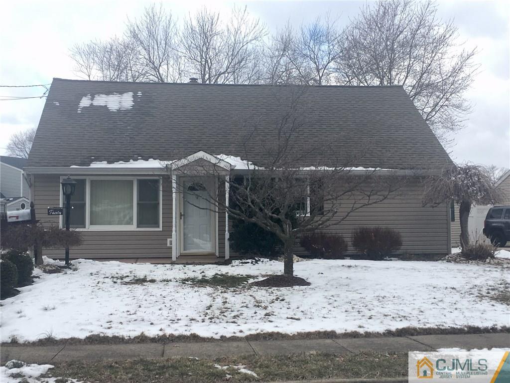 30 Altamont Road Edison, NJ 08817 - Photo 1 of 13 a view of a house with a yard covered in snow