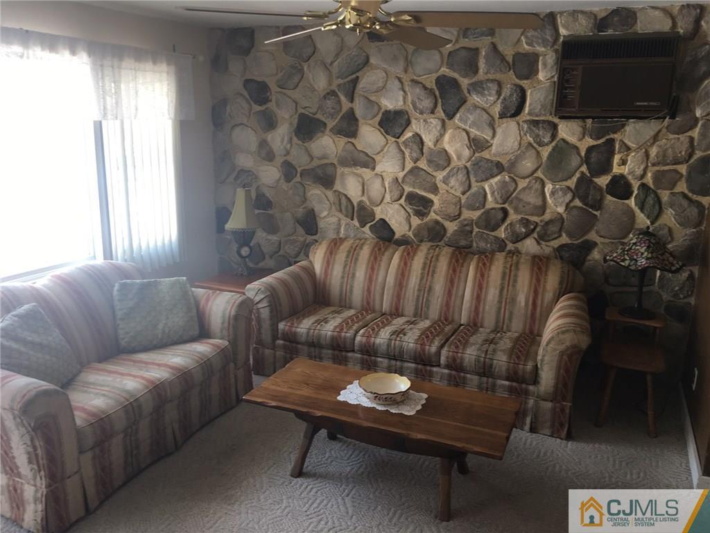 30 Altamont Road Edison, NJ 08817 - Photo 2 of 13 a living room with furniture and a window