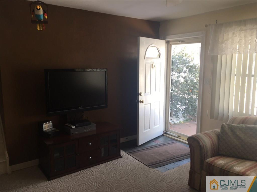 30 Altamont Road Edison, NJ 08817 - Photo 3 of 13 a living room with furniture and a flat screen tv