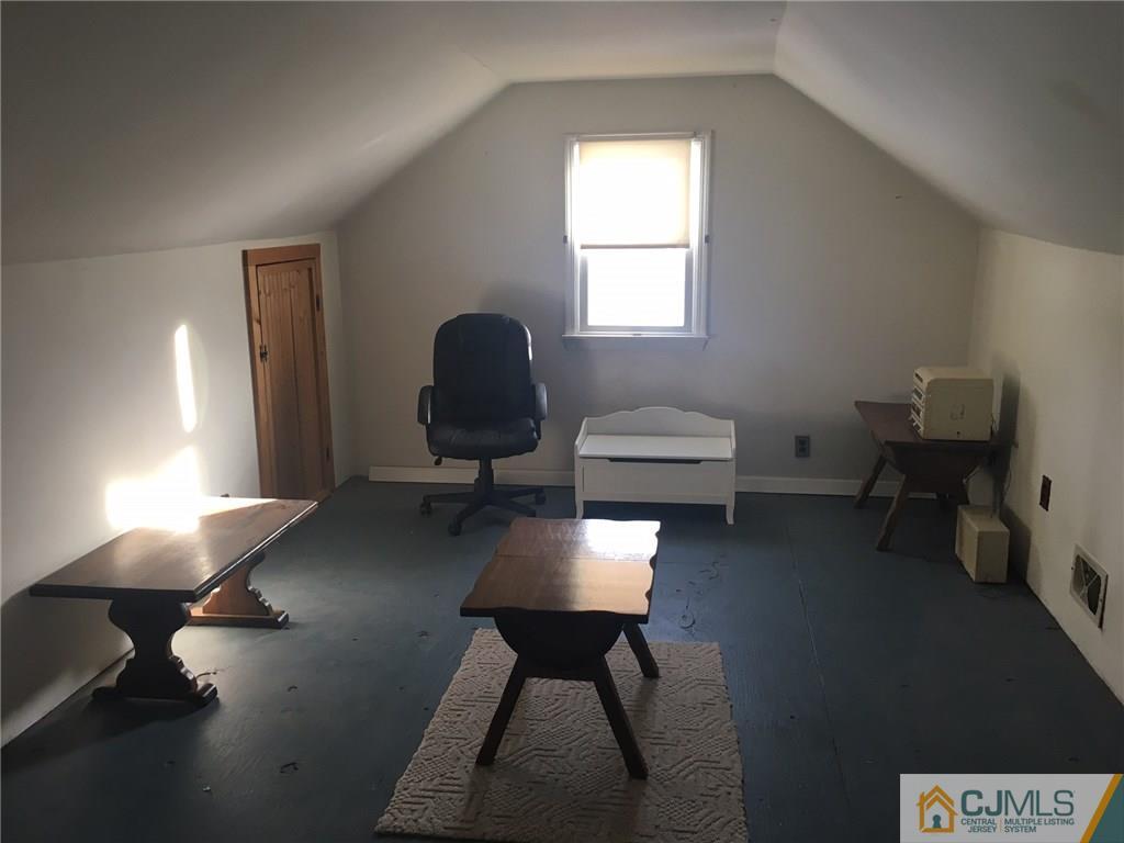 30 Altamont Road Edison, NJ 08817 - Photo 10 of 13 a living room with furniture and a window