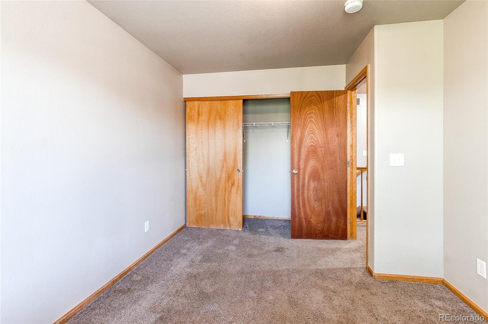 9776 Gatesbury Circle Highlands Ranch, CO 80126 - Photo 18 of 24 a view of an empty room