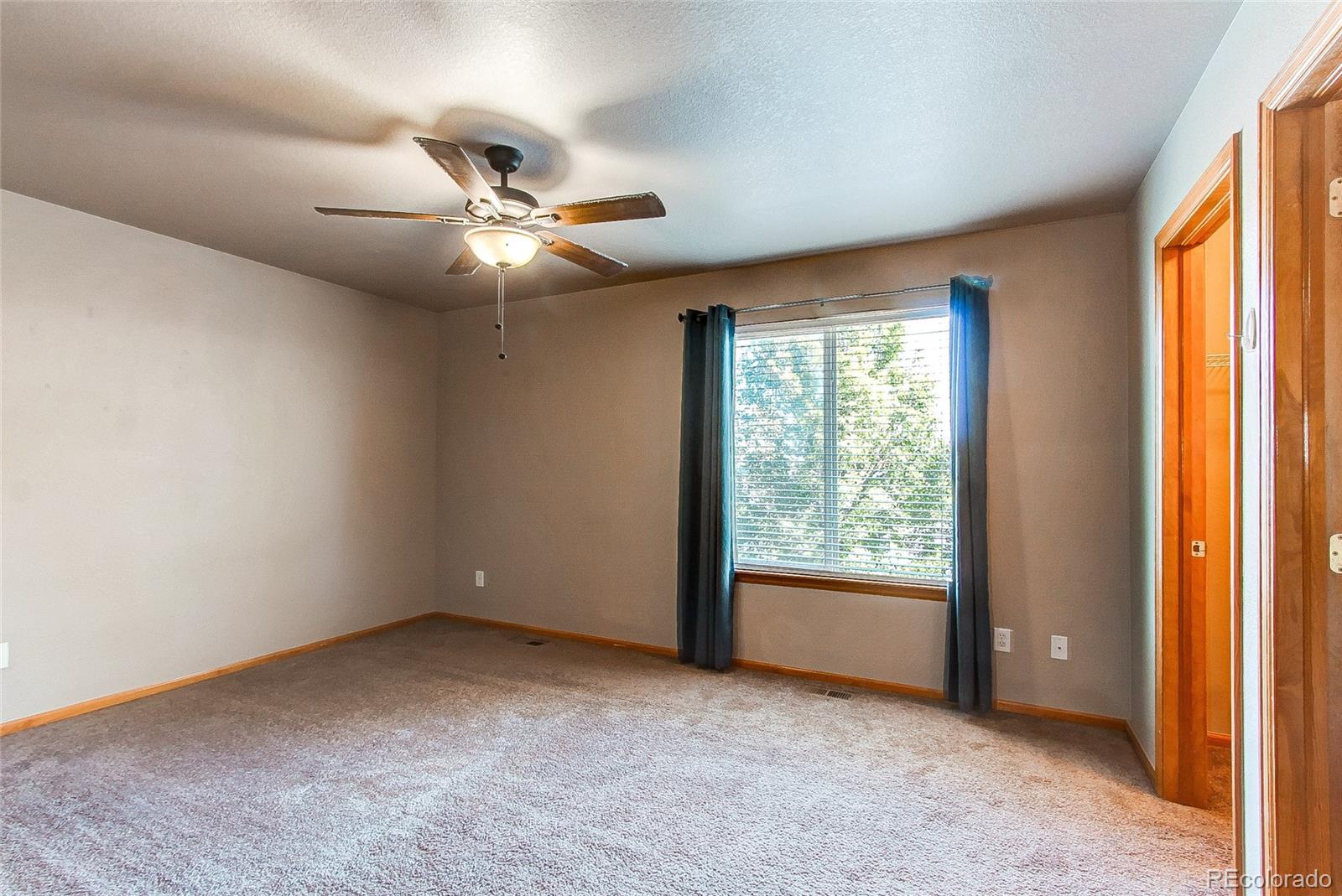9776 Gatesbury Circle Highlands Ranch, CO 80126 - Photo 21 of 24 a view of an empty room with a window