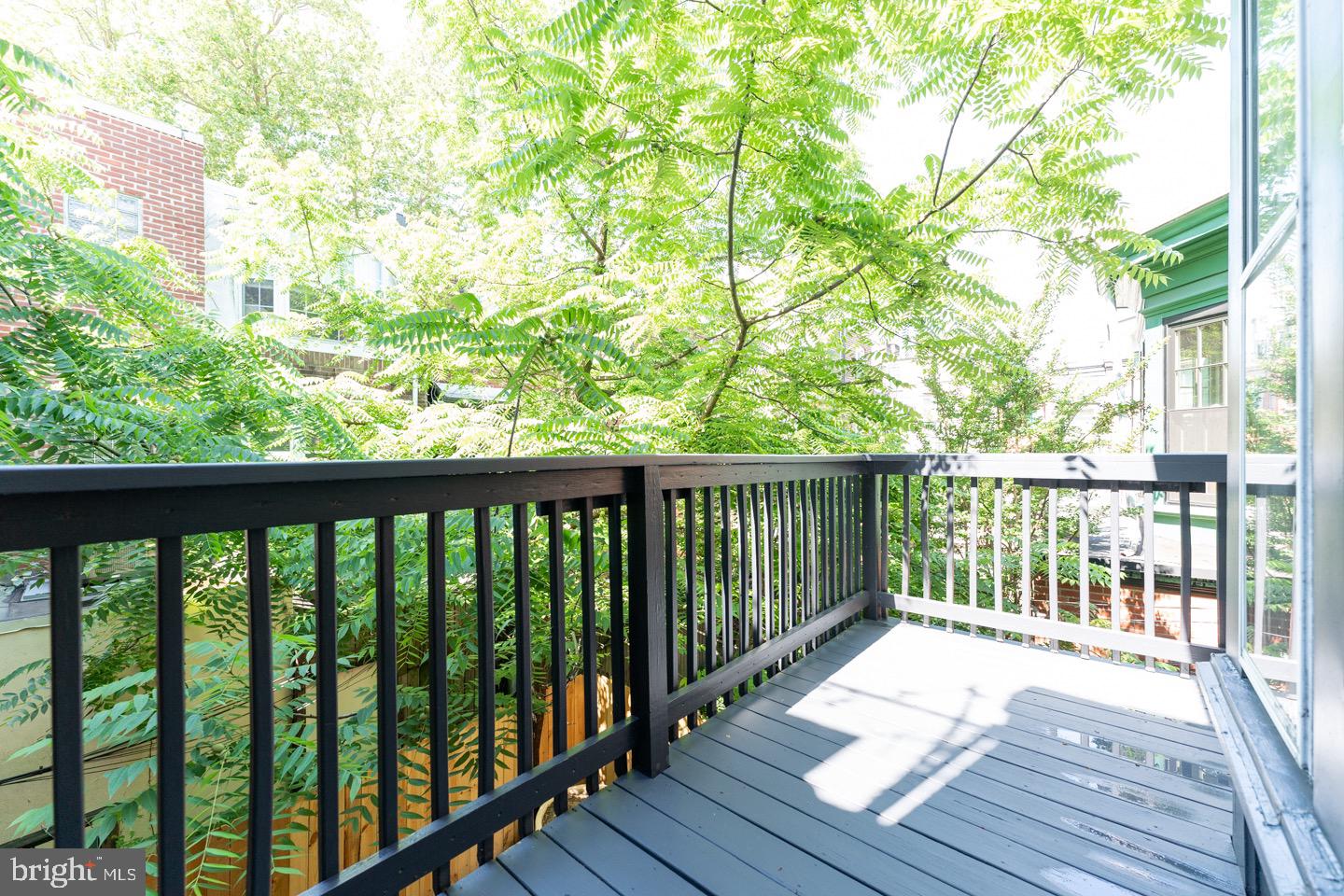 2118 Spruce Street, Unit 2R Philadelphia, PA 19103 - Photo 13 of 25 a view of balcony with wooden floor