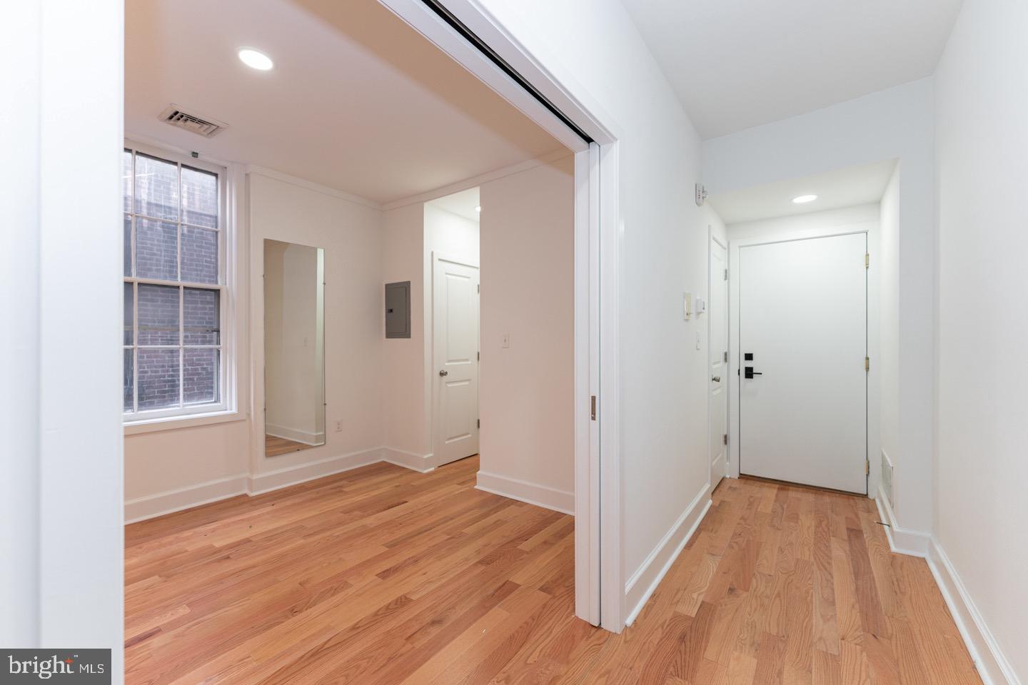 2118 Spruce Street, Unit 2R Philadelphia, PA 19103 - Photo 20 of 25 a view of wooden floor and windows in a room