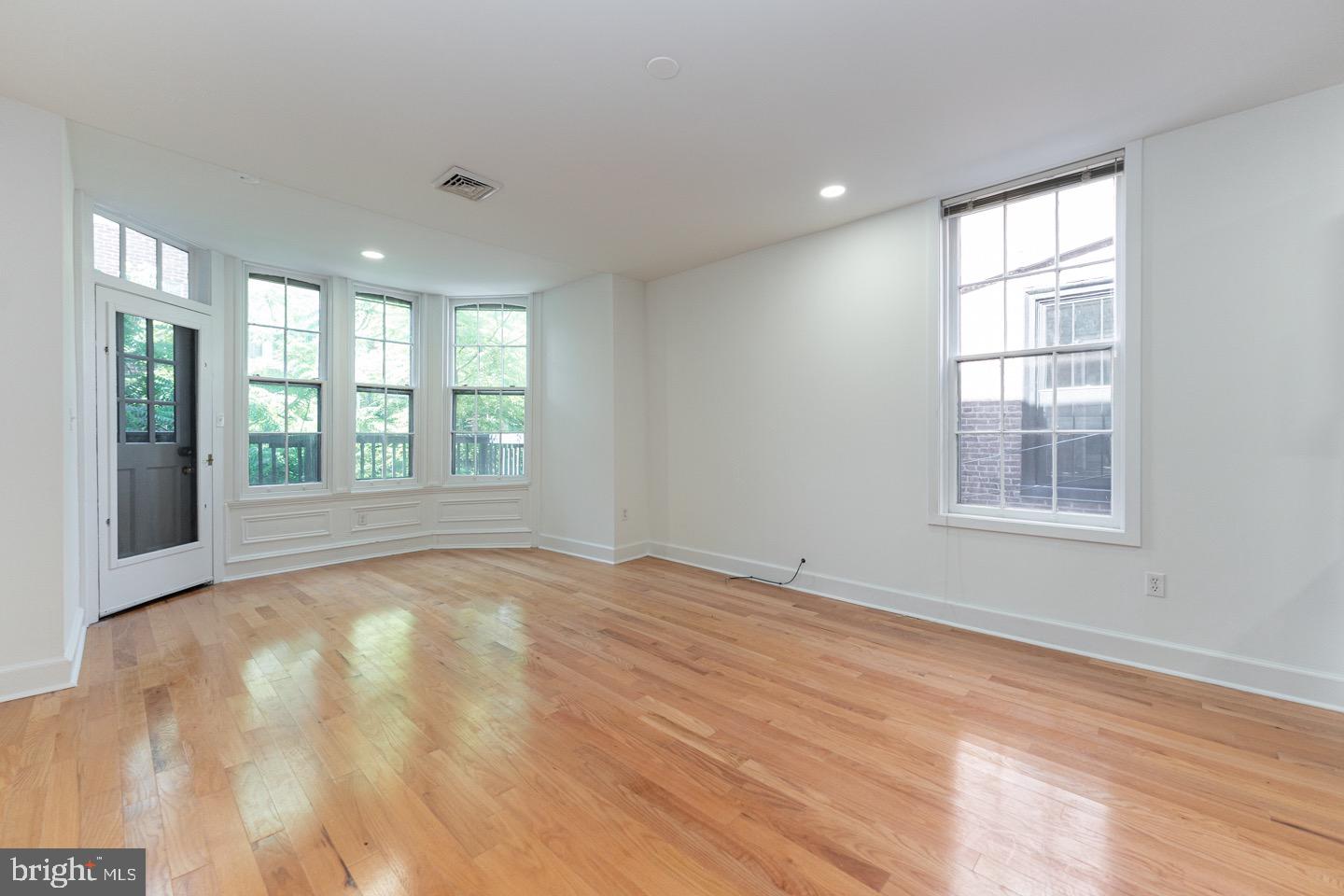 2118 Spruce Street, Unit 2R Philadelphia, PA 19103 - Photo 8 of 25 a view of an empty room with a window